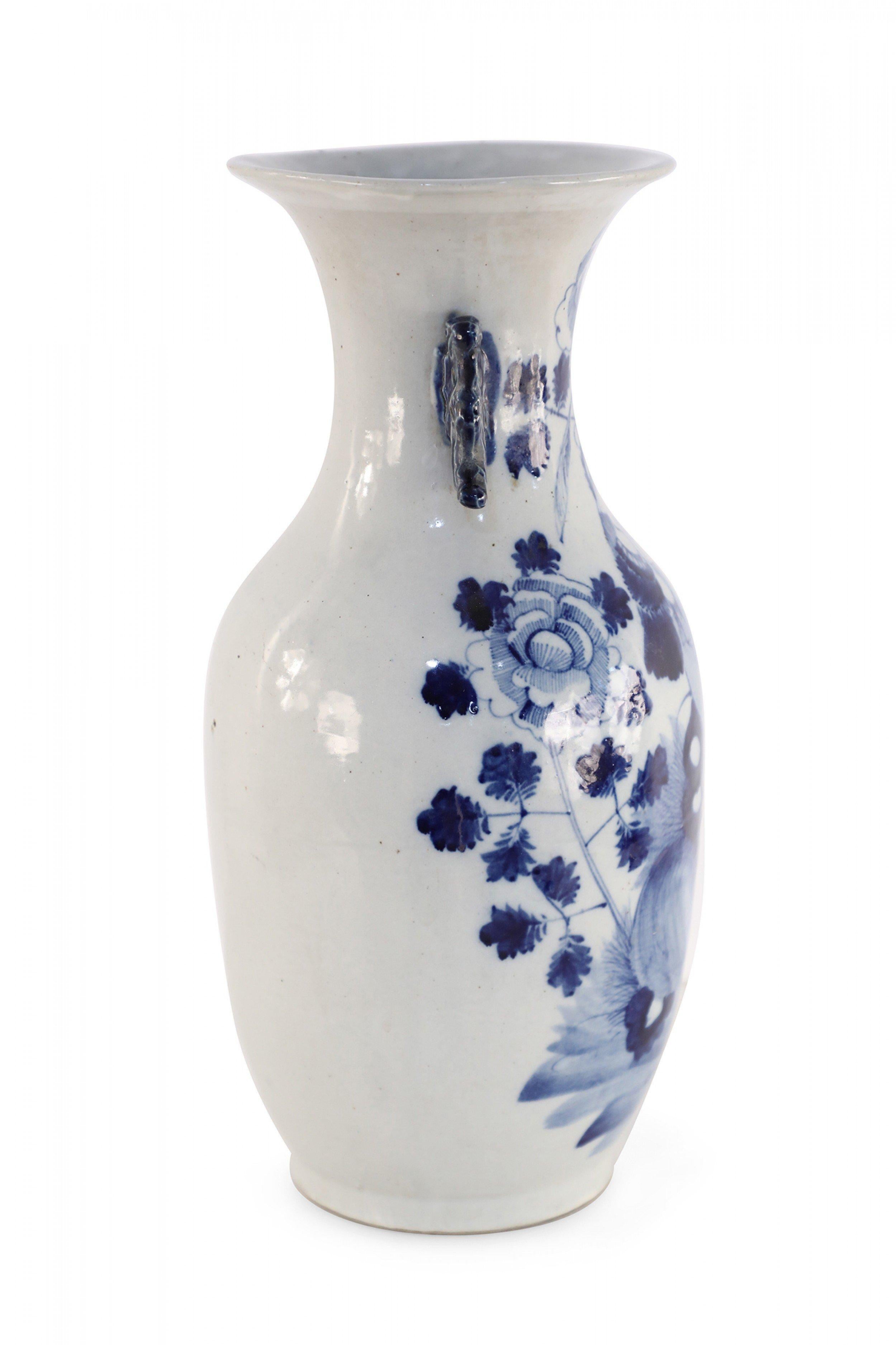 Chinese White and Blue Lily Pad and Floral Design Porcelain Urn In Good Condition For Sale In New York, NY