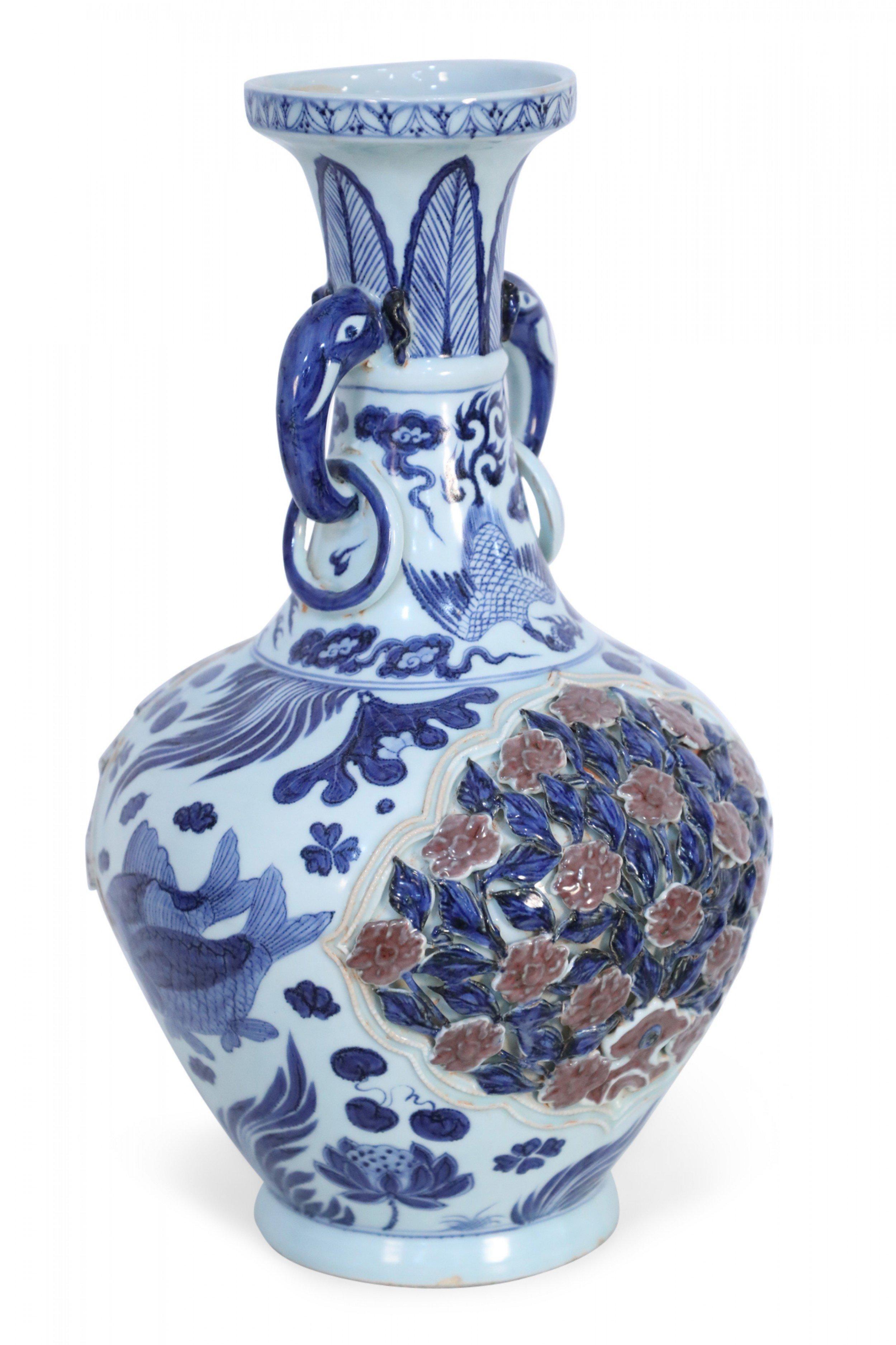 Chinese White and Blue Raised Rose Bush Design Porcelain Vase In Good Condition In New York, NY