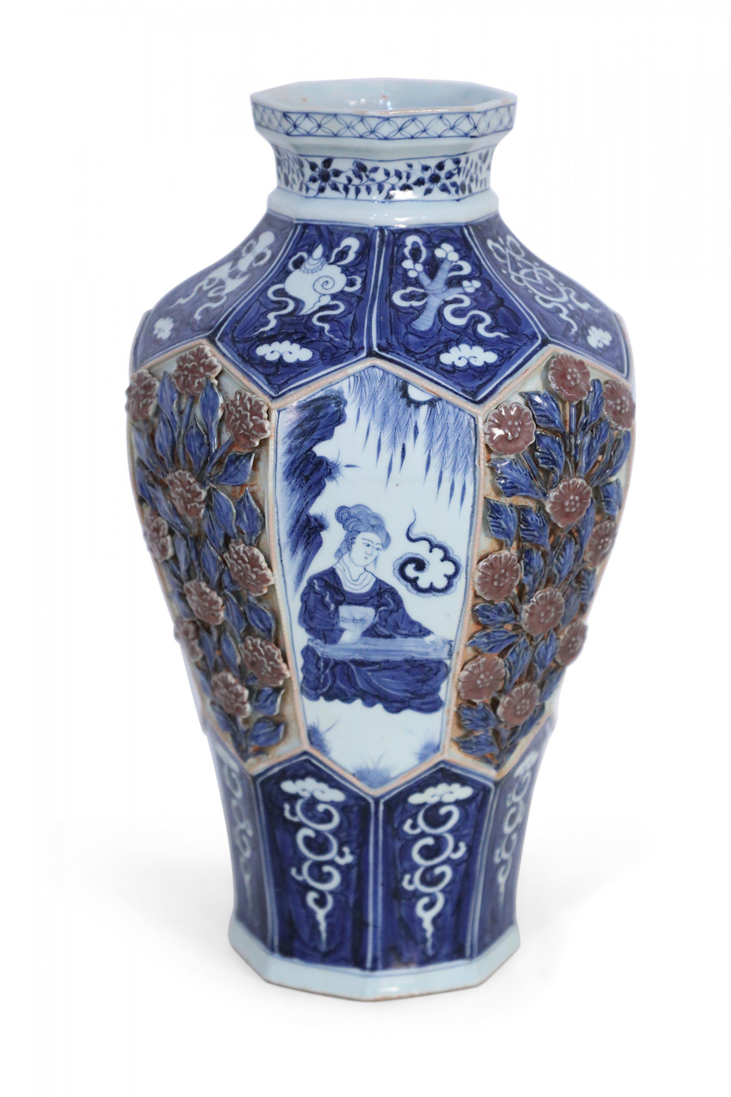 20th Century Chinese White and Blue Raised Rose Design Octagonal Porcelain Vase