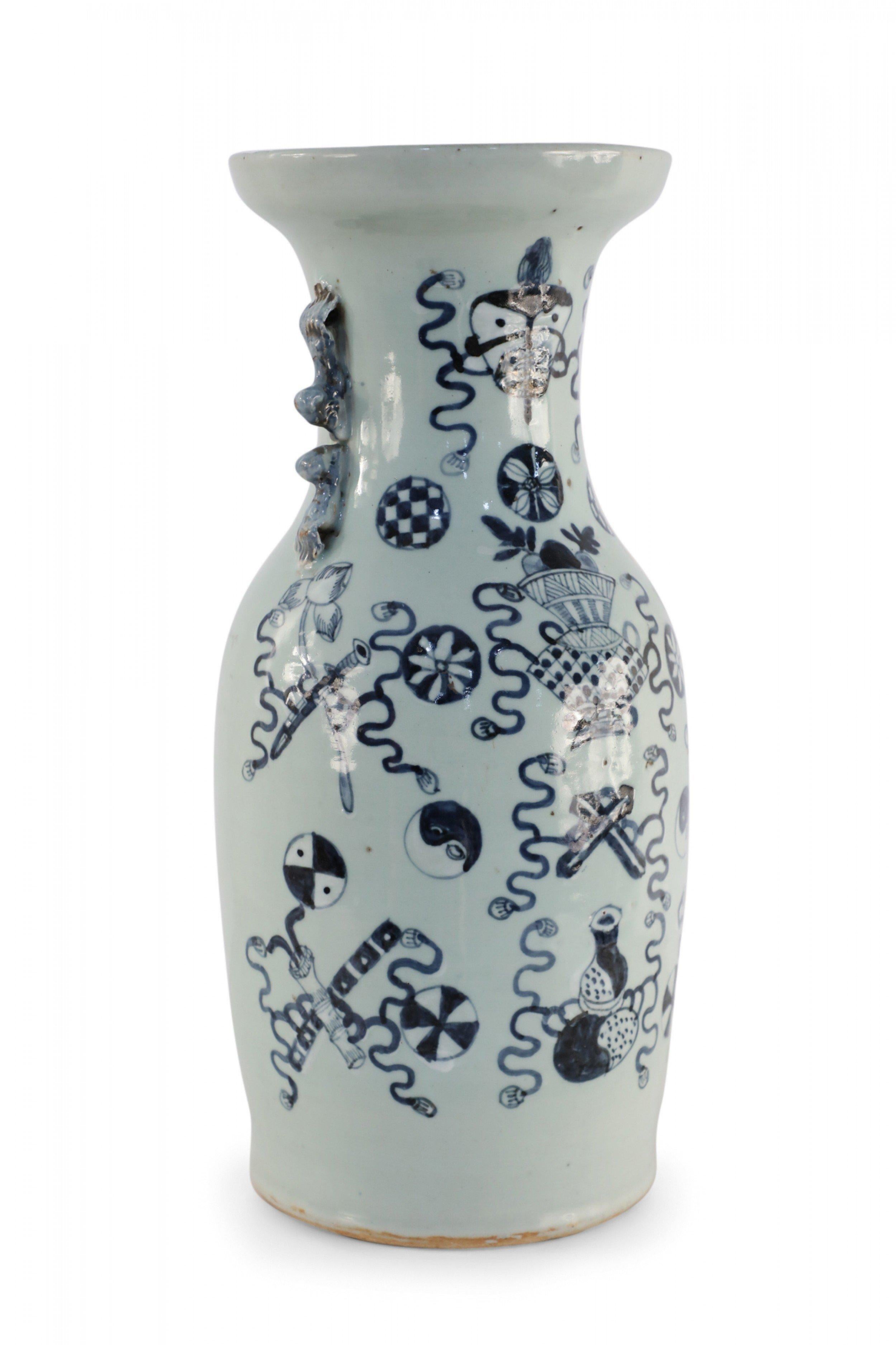 Antique Chinese (late 19th century) large, off-white porcelain urn painted with a navy blue pattern featuring Buddhist symbols and other shapes with accented blue scrolled handles.
    