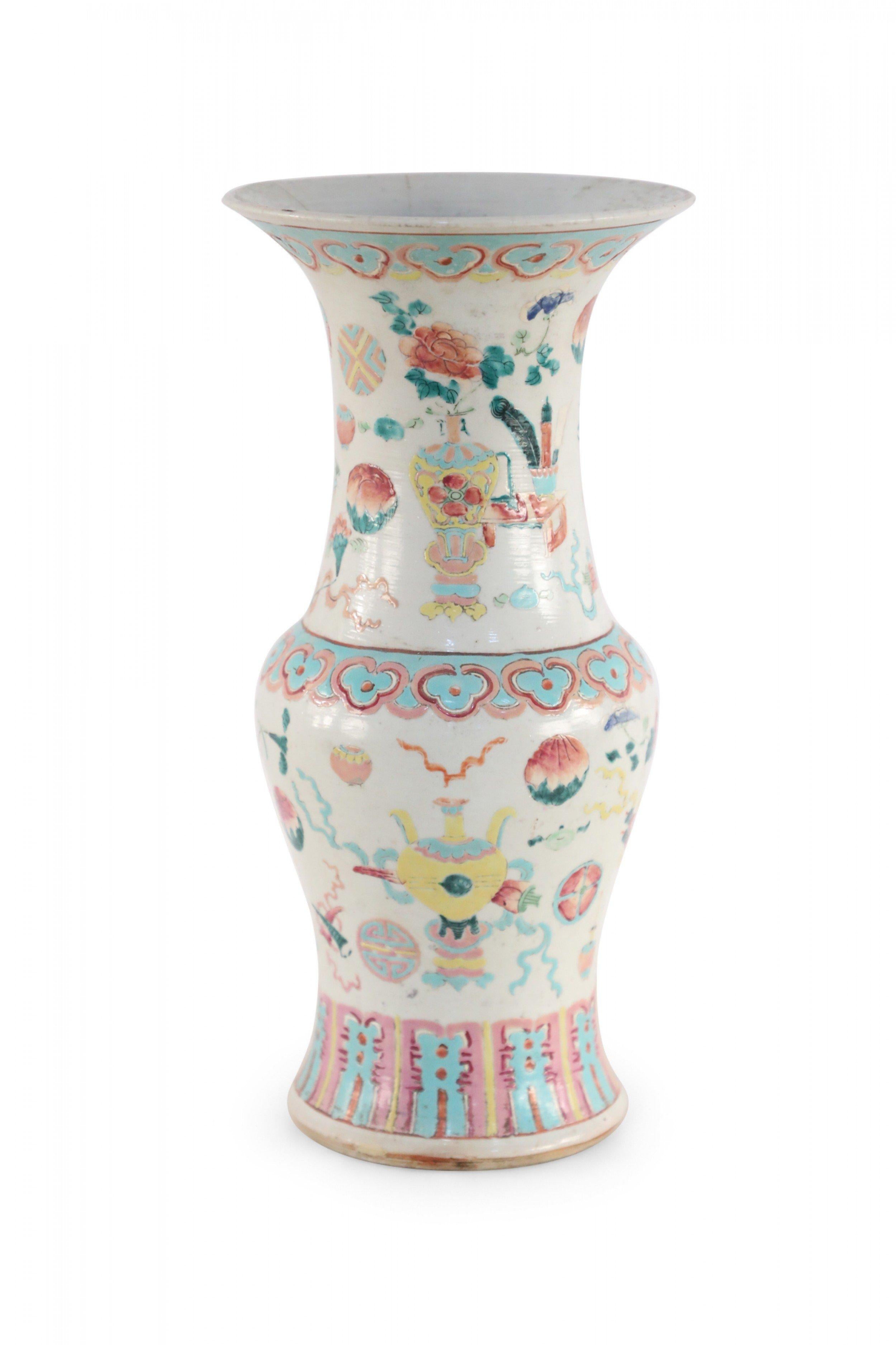 Antique Chinese (Early 20th Century) white porcelain urn painted with pink, light blue, and yellow bogu pattern - a traditional decorative theme that employs items like bronzeware, porcelain, jade pieces, paintings, calligraphy, and bonsai to