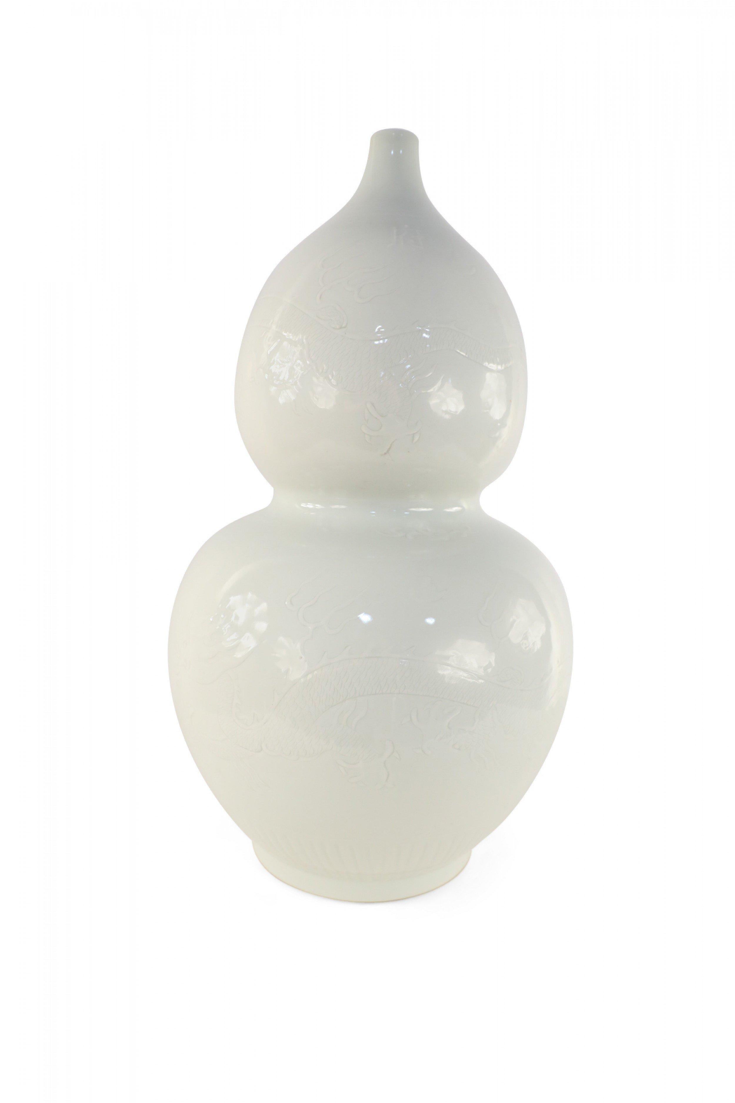 20th Century Chinese White Double Gourd Dragon Motif Porcelain Bottle For Sale