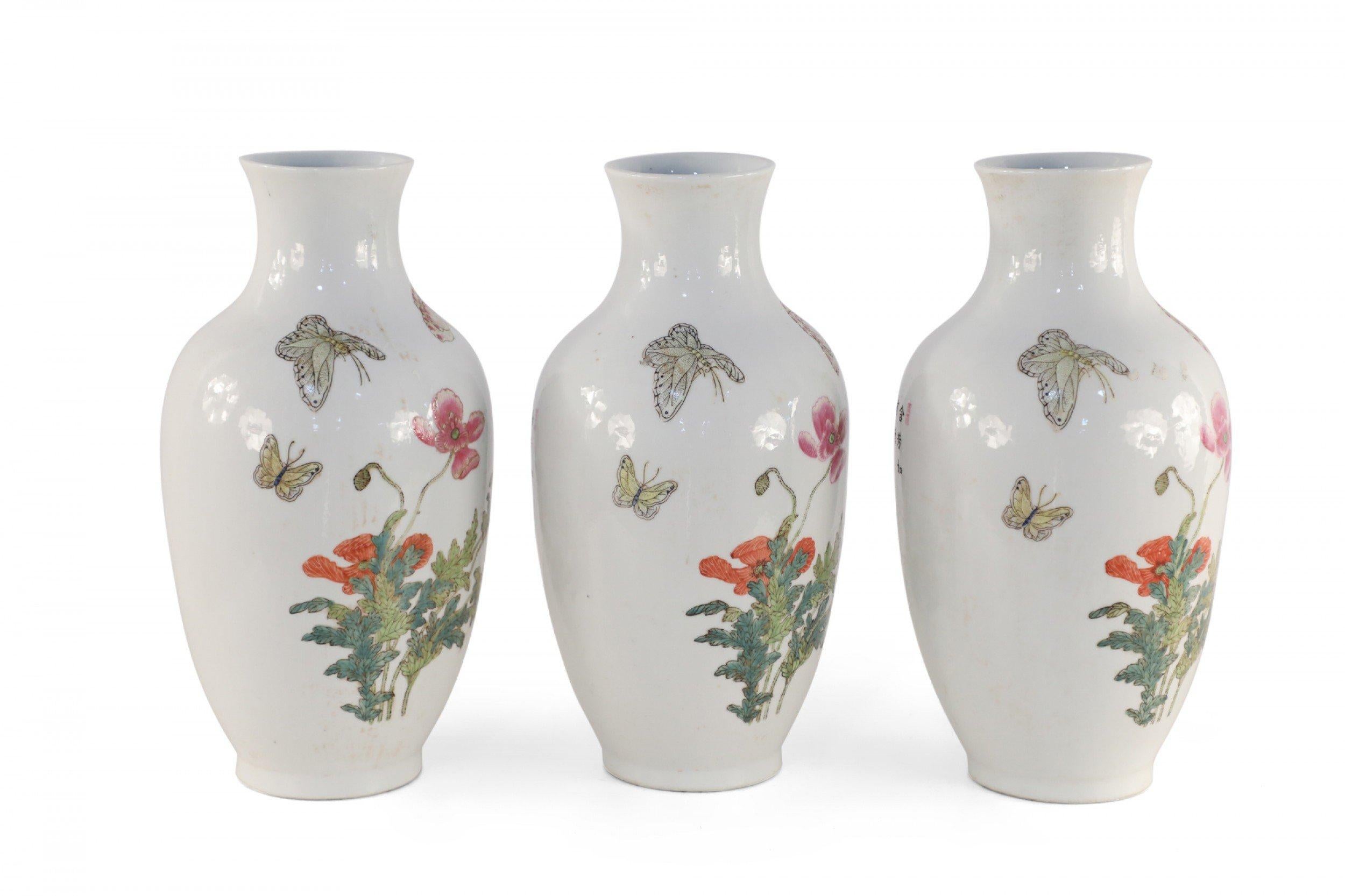 Chinese Export Chinese White Floral and Butterfly Patterned Porcelain Vases For Sale