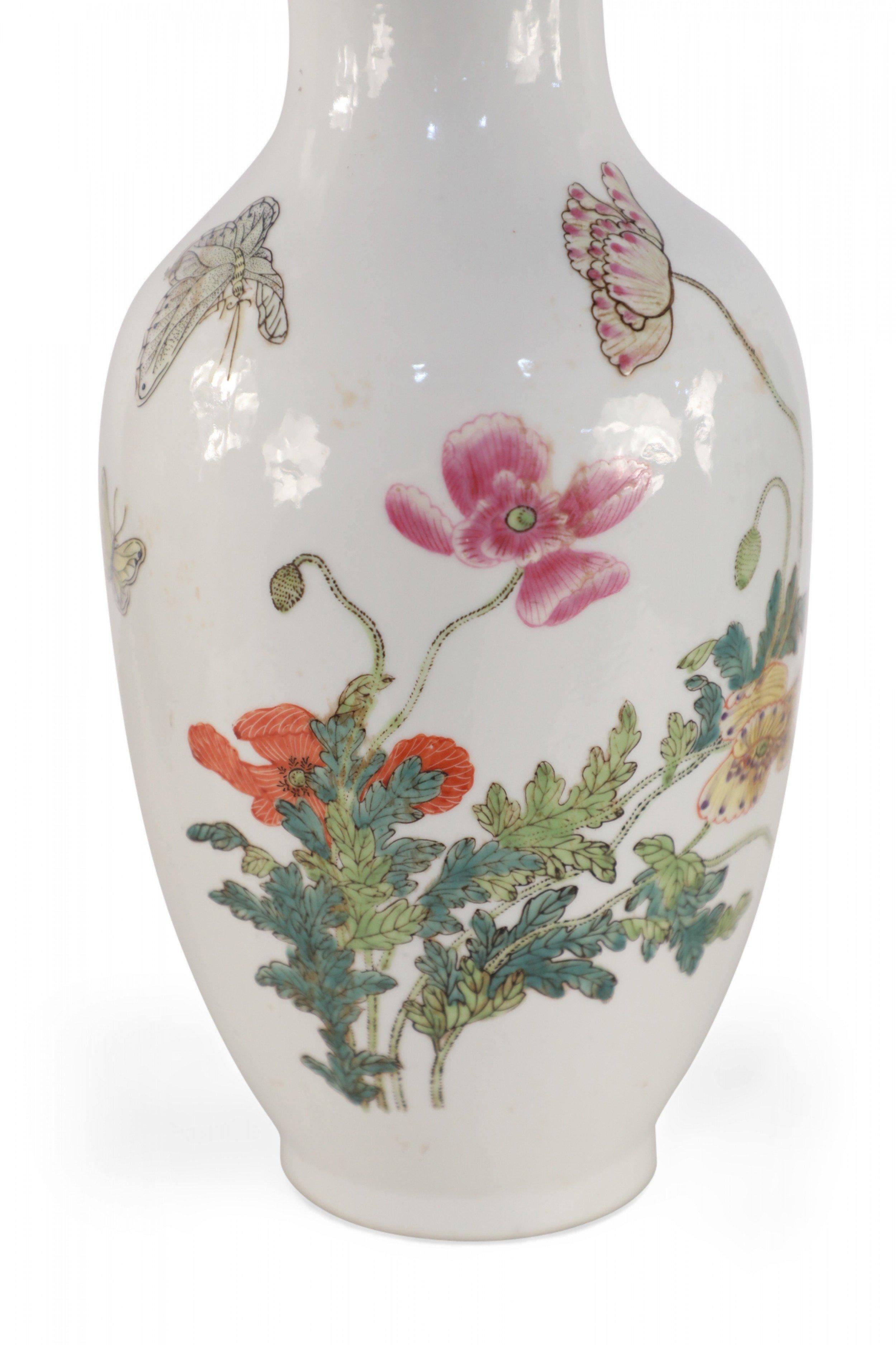 Chinese White Floral and Butterfly Patterned Porcelain Vases In Good Condition For Sale In New York, NY