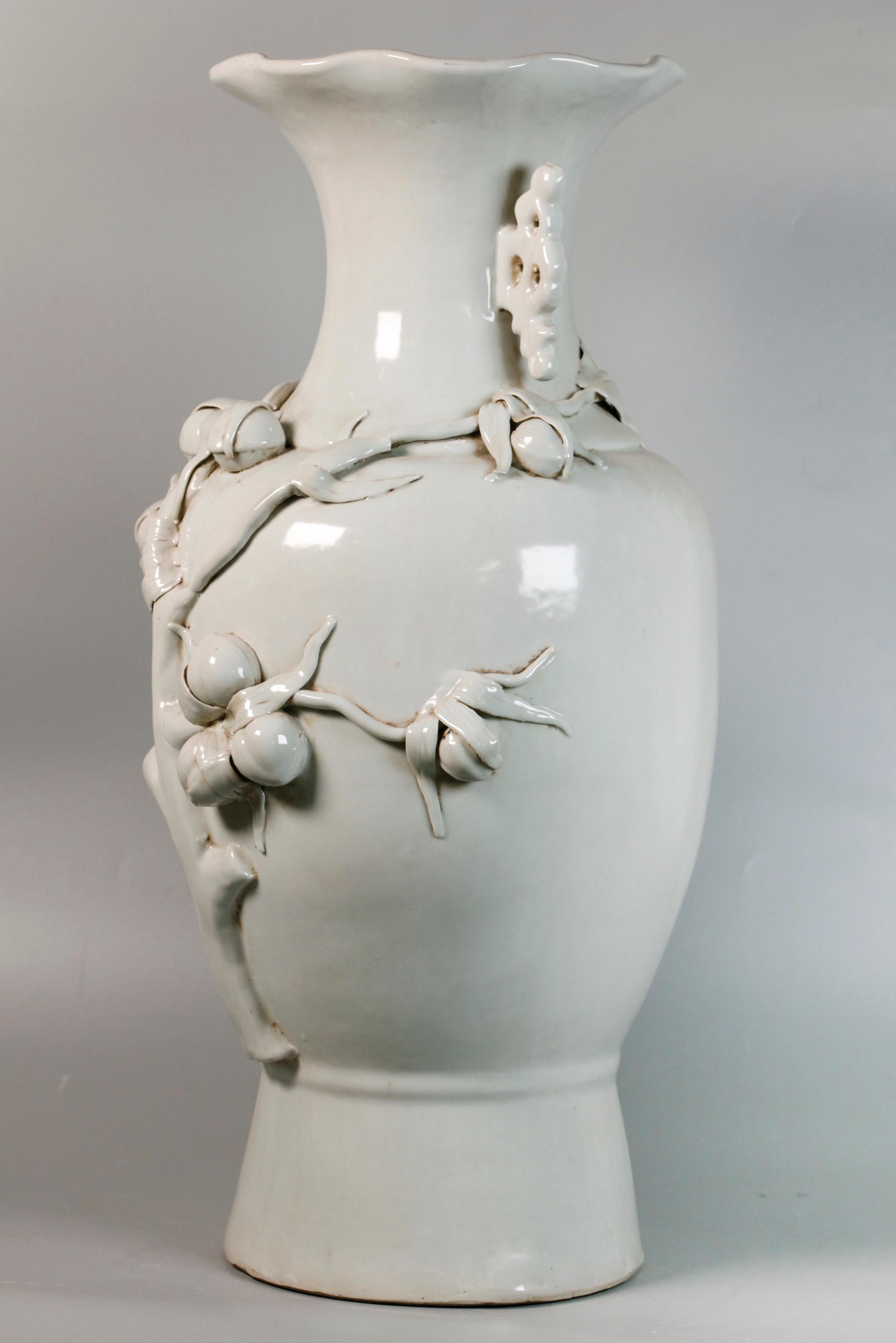 decorated with peaches in high relief