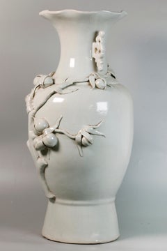 Chinese white glazed porcelain peach vase