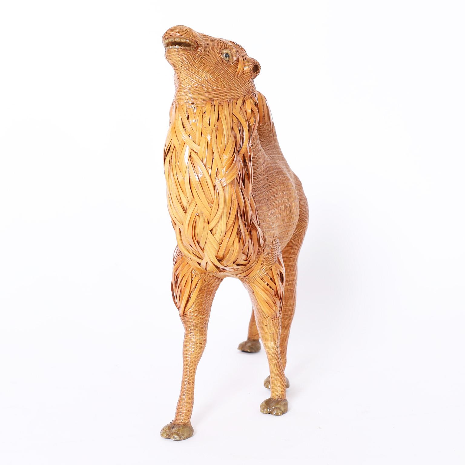 Mid century Chinese smiling camel caught in mid strut, ambitiously crafted in wicker with wood highlights. From the noted Shanghai Collection.