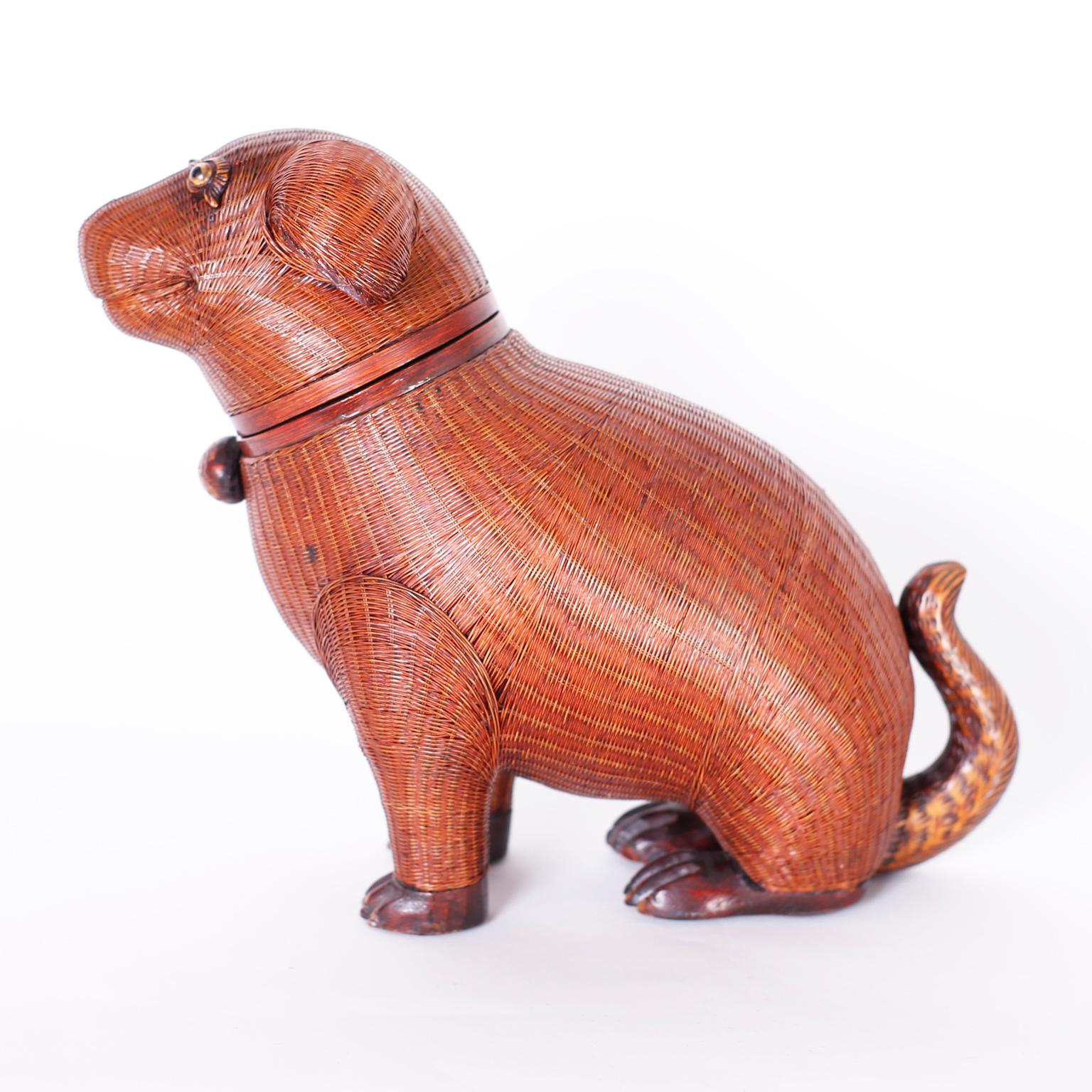 Mid century Chinese puppy box from the Shanghai collection ambitiously crafted in bamboo wicker with carved wood feet and tail.