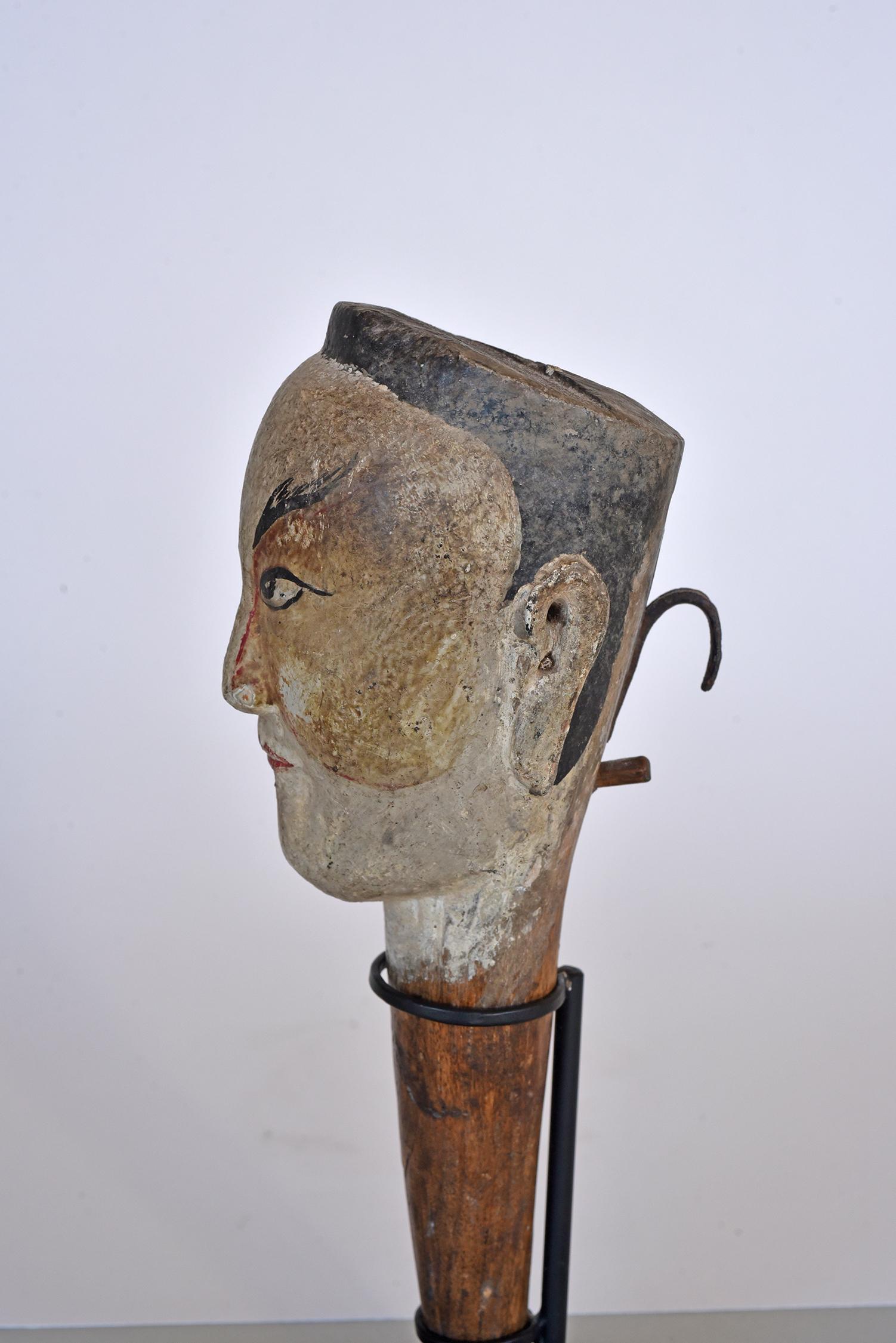 wooden puppet head