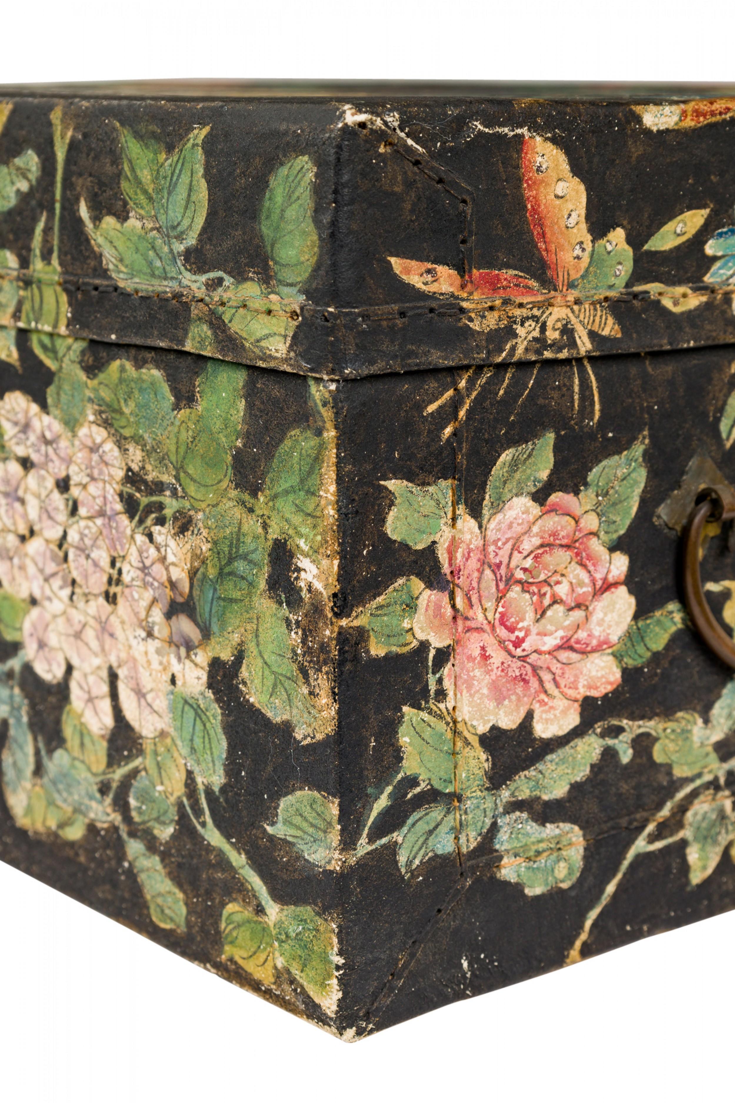 Chinese Mid-Century small rectangular hinged chest with metal latch and two side ring handles, hand painted featuring two exotic birds (depicted on the top and front), pine, berries, fungi and various flora over a network of leaves on a black