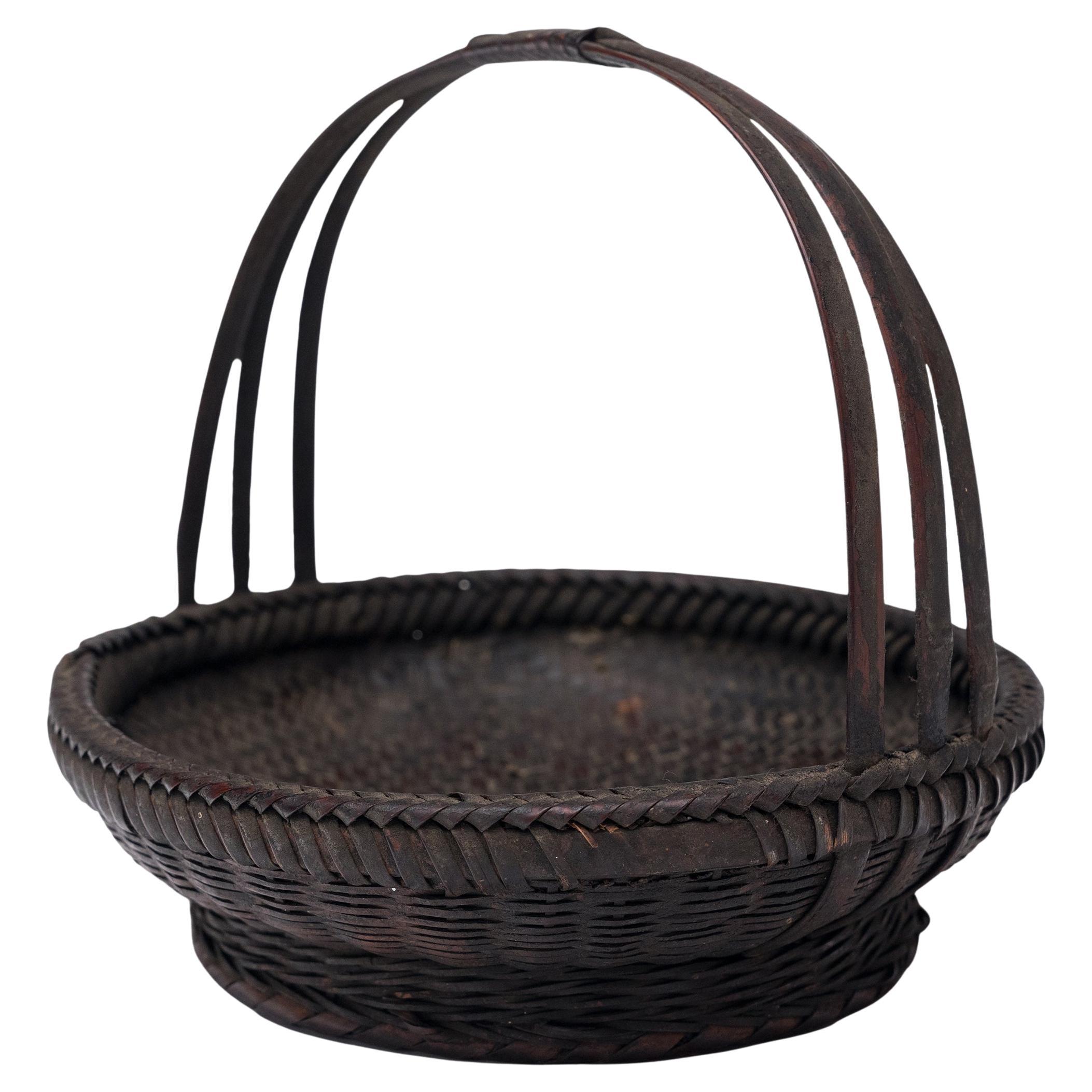 Cestino cinese di fiori di bambù intrecciati, anni
40 circa