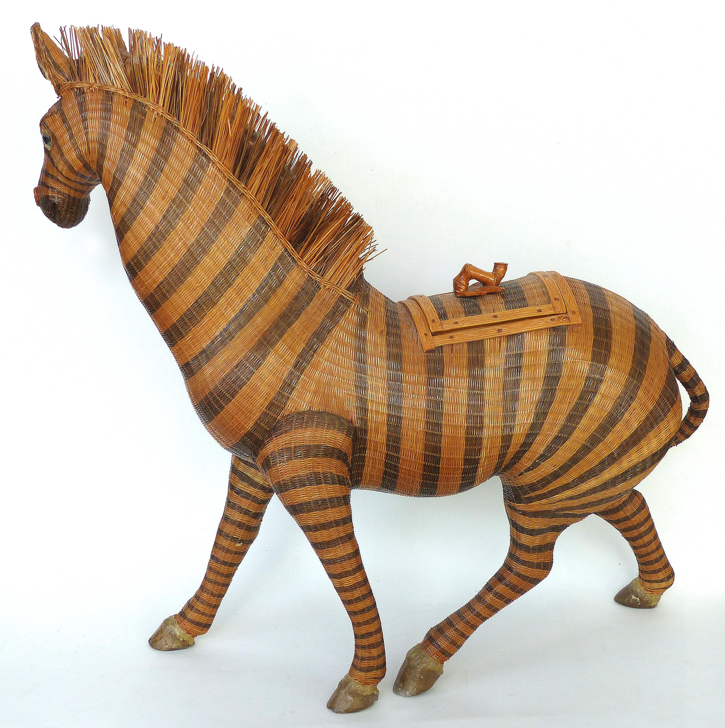 Chinese Woven Reed Zebra Trinket Box

Offered for sale is an intricately woven and finely detailed figure of a zebra from China, circa 1970. The zebra is not only a wonderful decorative object but also serves as a trinket box or basket. There is a