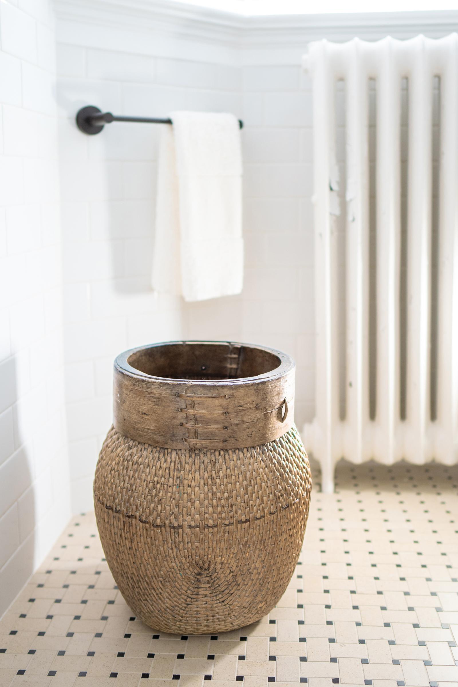 Centuries ago, a woven reed fisherman’s basket such as this would have been common in rural China as an everyday item, used until it became worn through. This hand-woven example remains in beautiful condition and features a tapered woven body