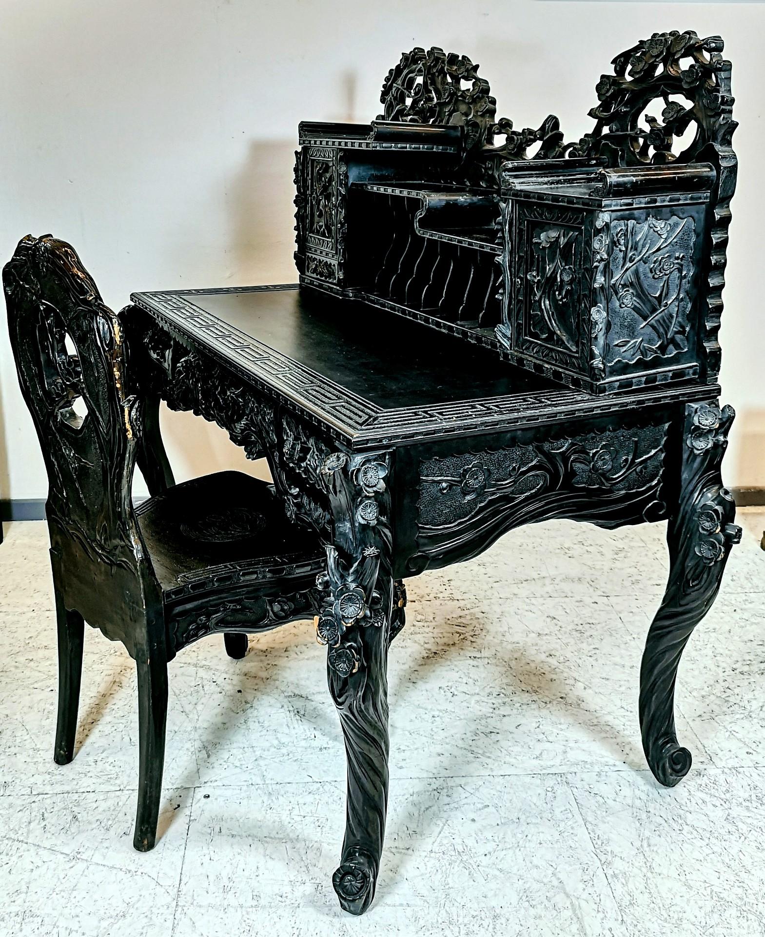 We are delighted to offer for sale this stunning hand carved Chinese export desk and matching chair.
The carving is ornate, sublime and exquisite, there is something interesting to see from every angle.
The set is from circa 1900s. In vintage