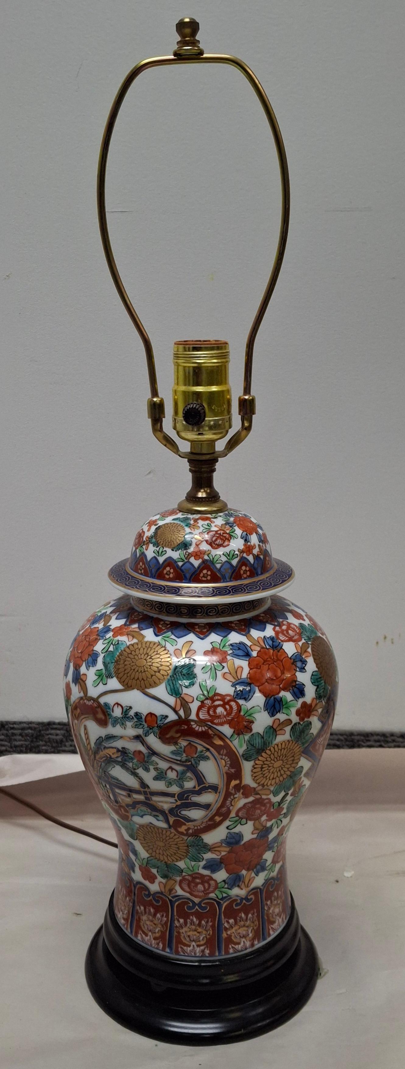 A Chinese Wucai Porcelain Vase Lamp with ebonized base.
Measures 6