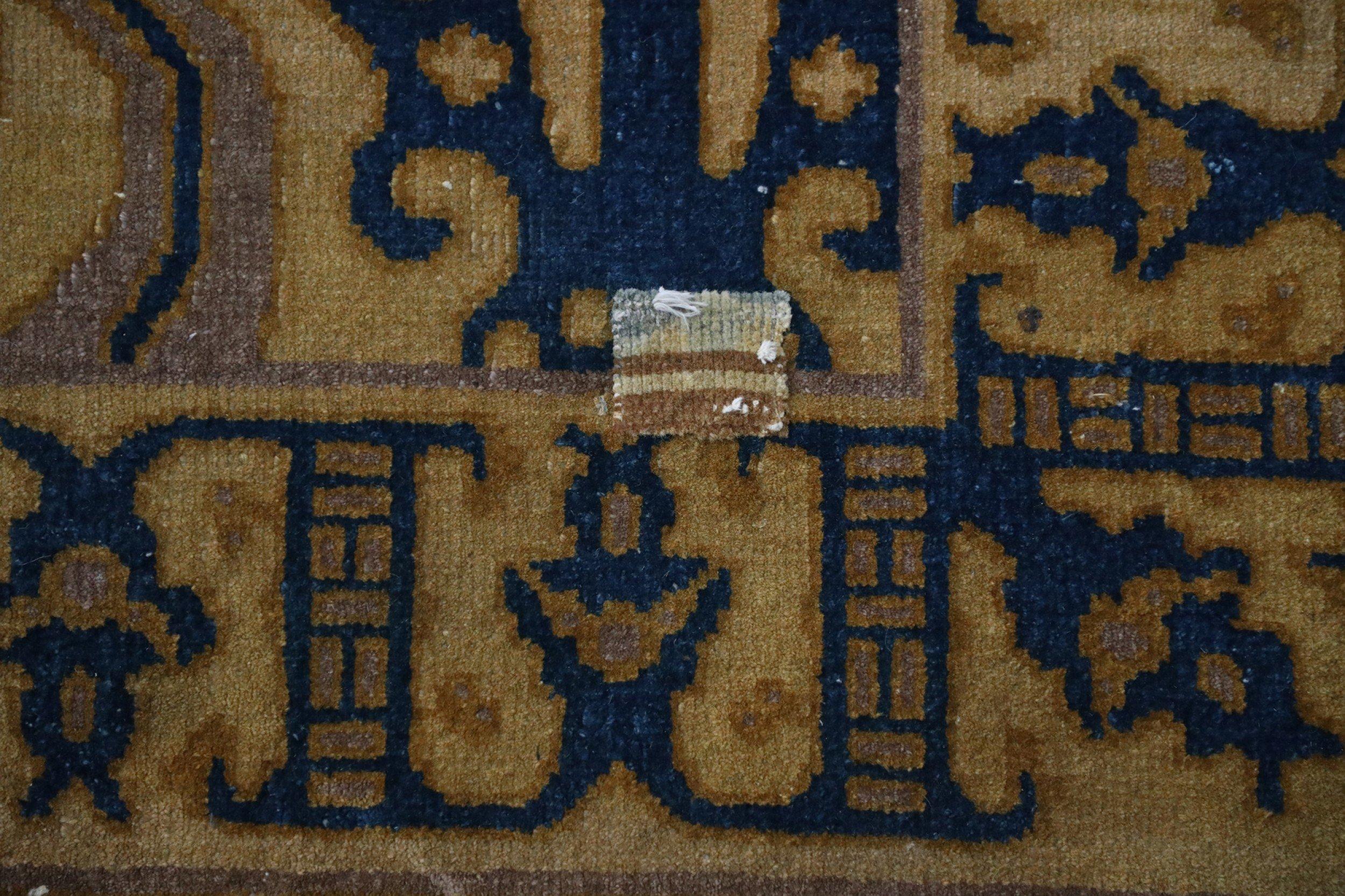 Antique Chinese (late 19th century) high pile carpet with a yellow field and blue and ochre details. Measures: (11 3/4' x 17 1/3').
 