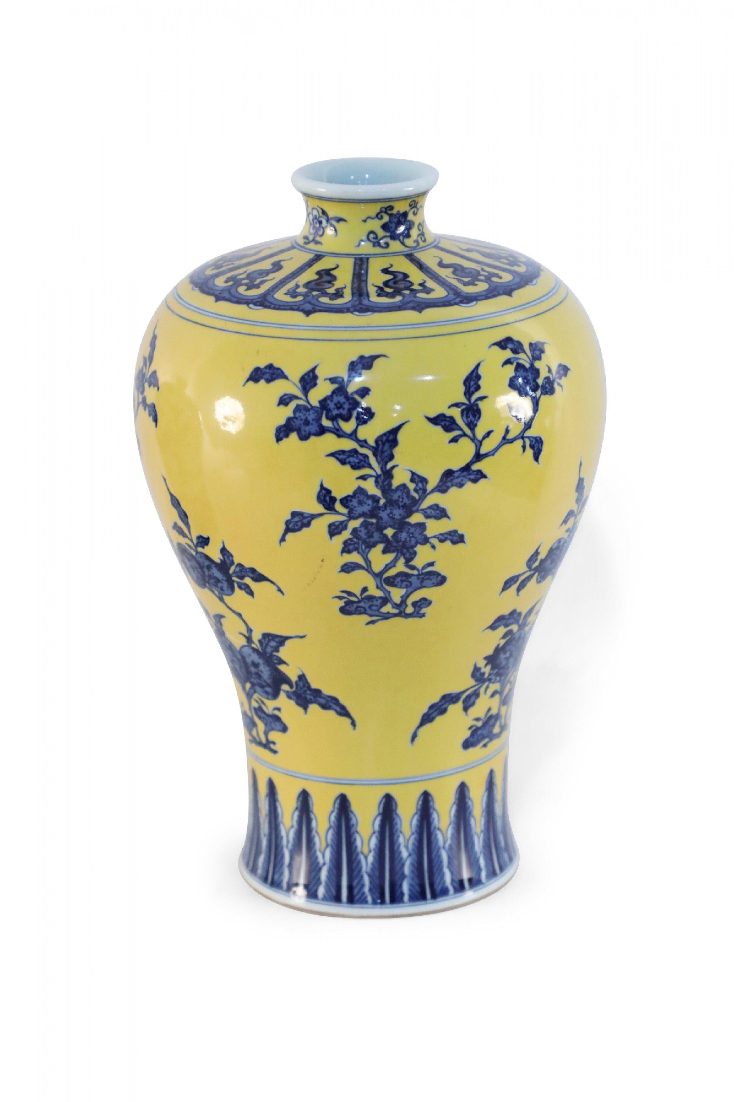 Antique Chinese (19th century) yellow porcelain Meiping vase decorated with blue florals and geometric bands around the top and the base (date mark on bottom, see photos).
    