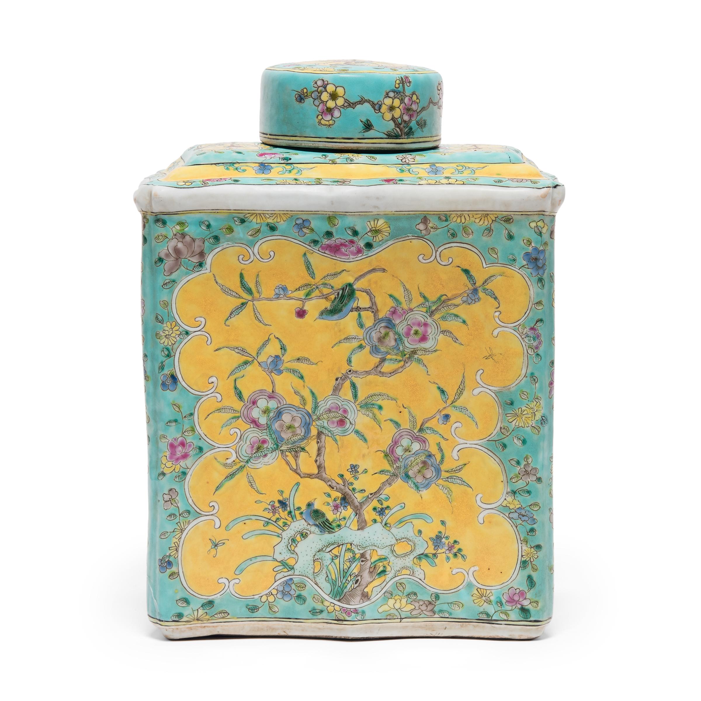 Brightly colored in yellow and turquoise, this impressive tea leaf jar is decorated in a style of overglaze enameling known as 