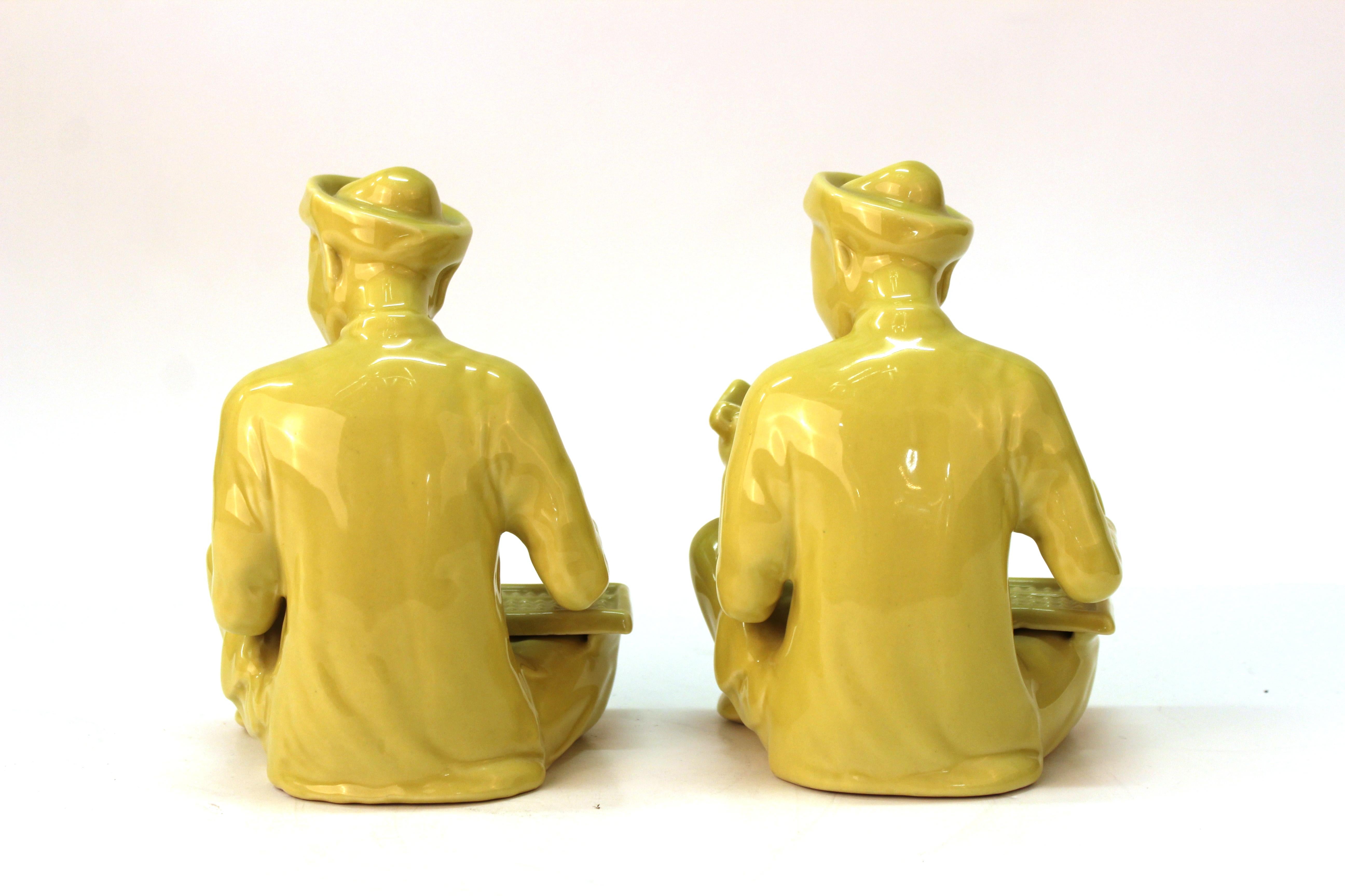 Chinese Export Chinese Yellow Ceramic Seated Mandarin Statues