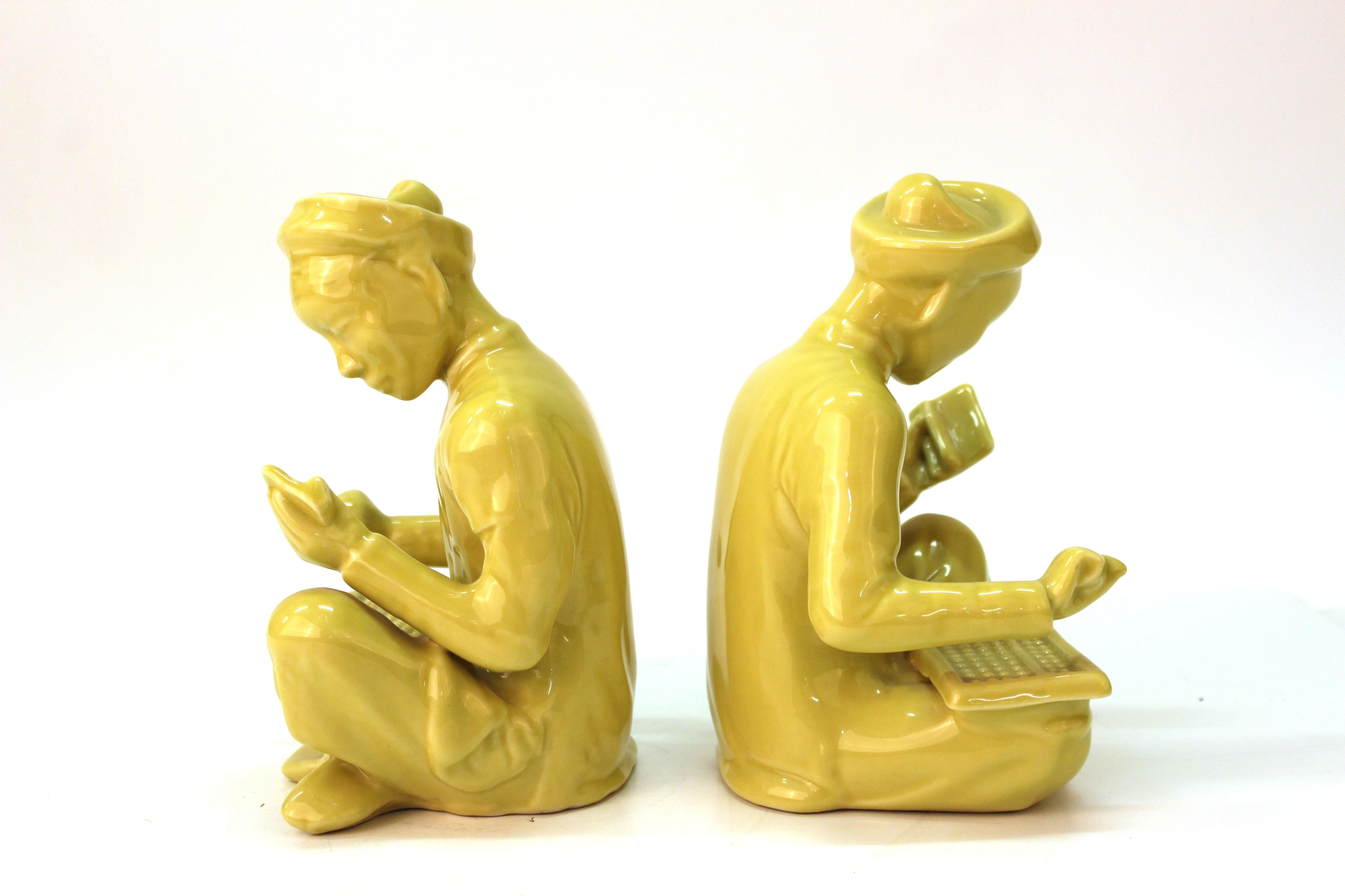 Chinese Yellow Ceramic Seated Mandarin Statues In Good Condition In New York, NY