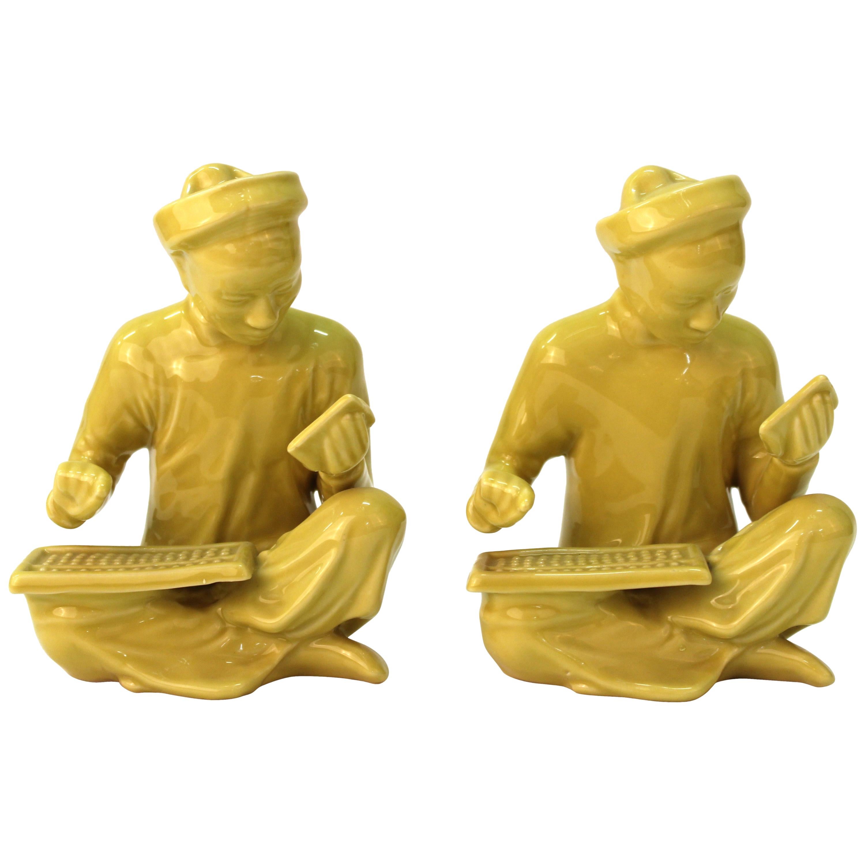 Chinese Yellow Ceramic Seated Mandarin Statues