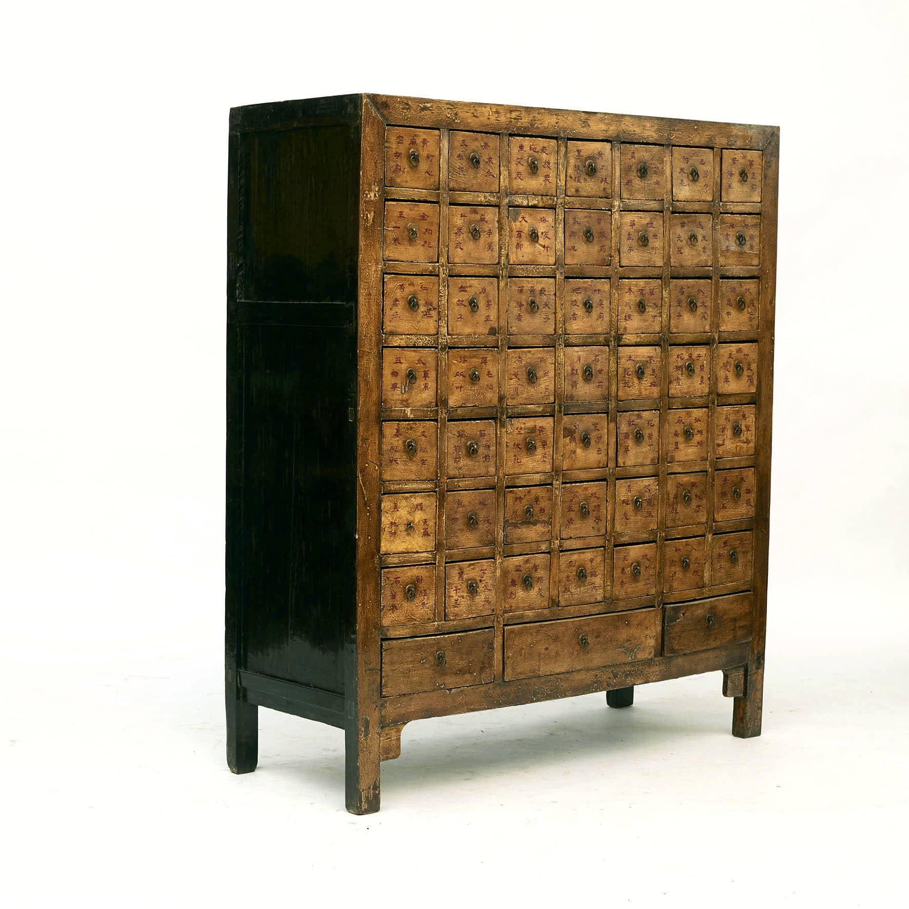 Chinese apothecary / pharmacy medicine chest with 52 drawers. These were used to store and organise Chinese herbs and the drawers were labeled according to the herbs that were stored inside.
Original mustard-yellow colored lacquer, top and sides