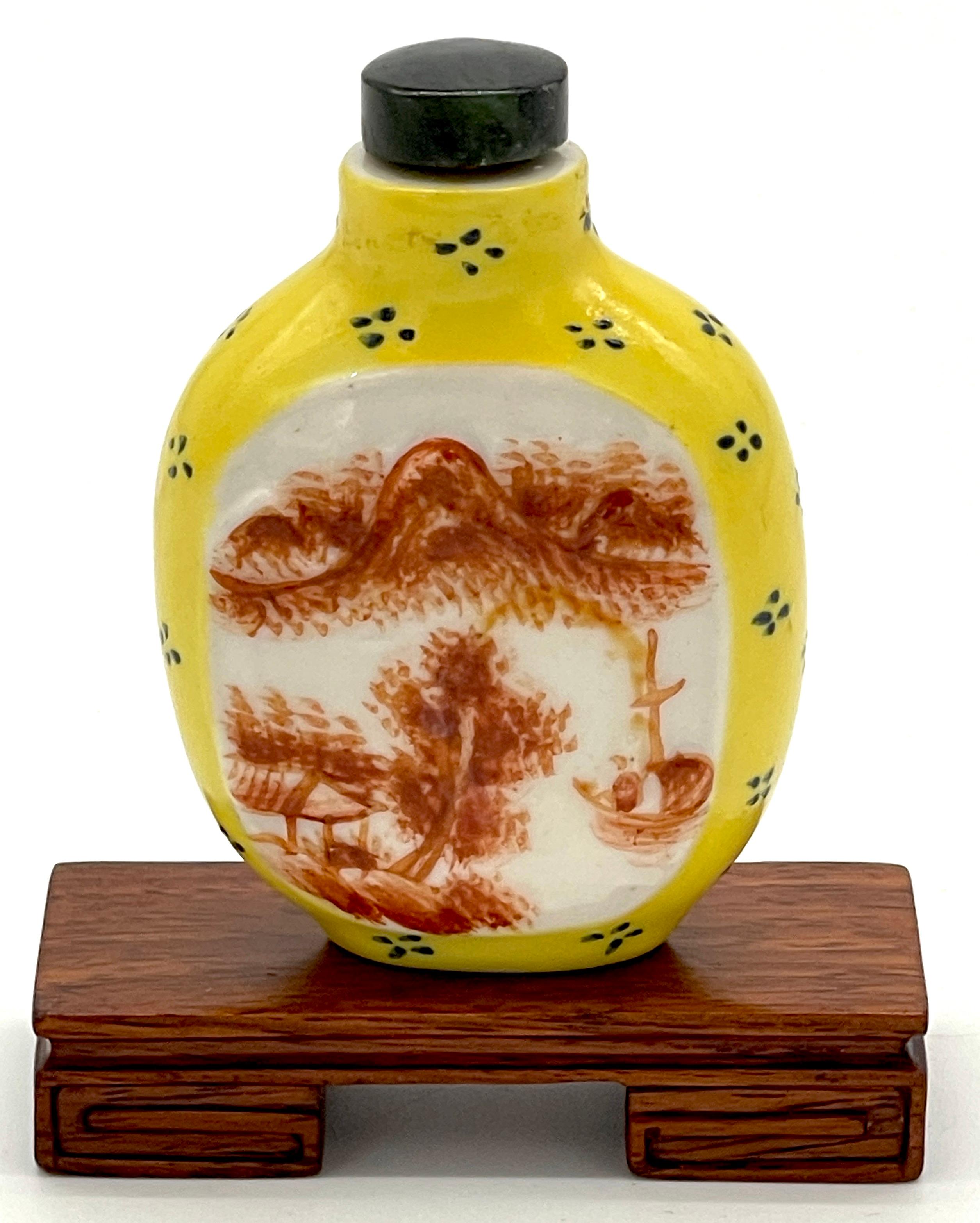 Chinese Yellow Peaking Glass Scenic & Hardstone Snuff Bottle & Stand, Signed 
China, 1900s- 20th Century 

A beautiful Chinese yellow Peking glass scenic & hardstone snuff bottle & stand. This fine example features an imperial yellow background,