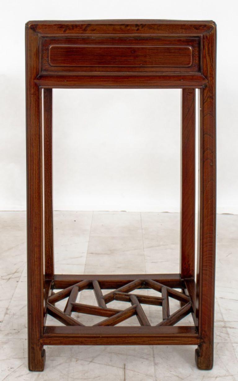 Chinese stained Yu Mu or Elm wood table, the rectangular top above a side-facing drawer over four long square legs conjoined by a Bing Lie or 