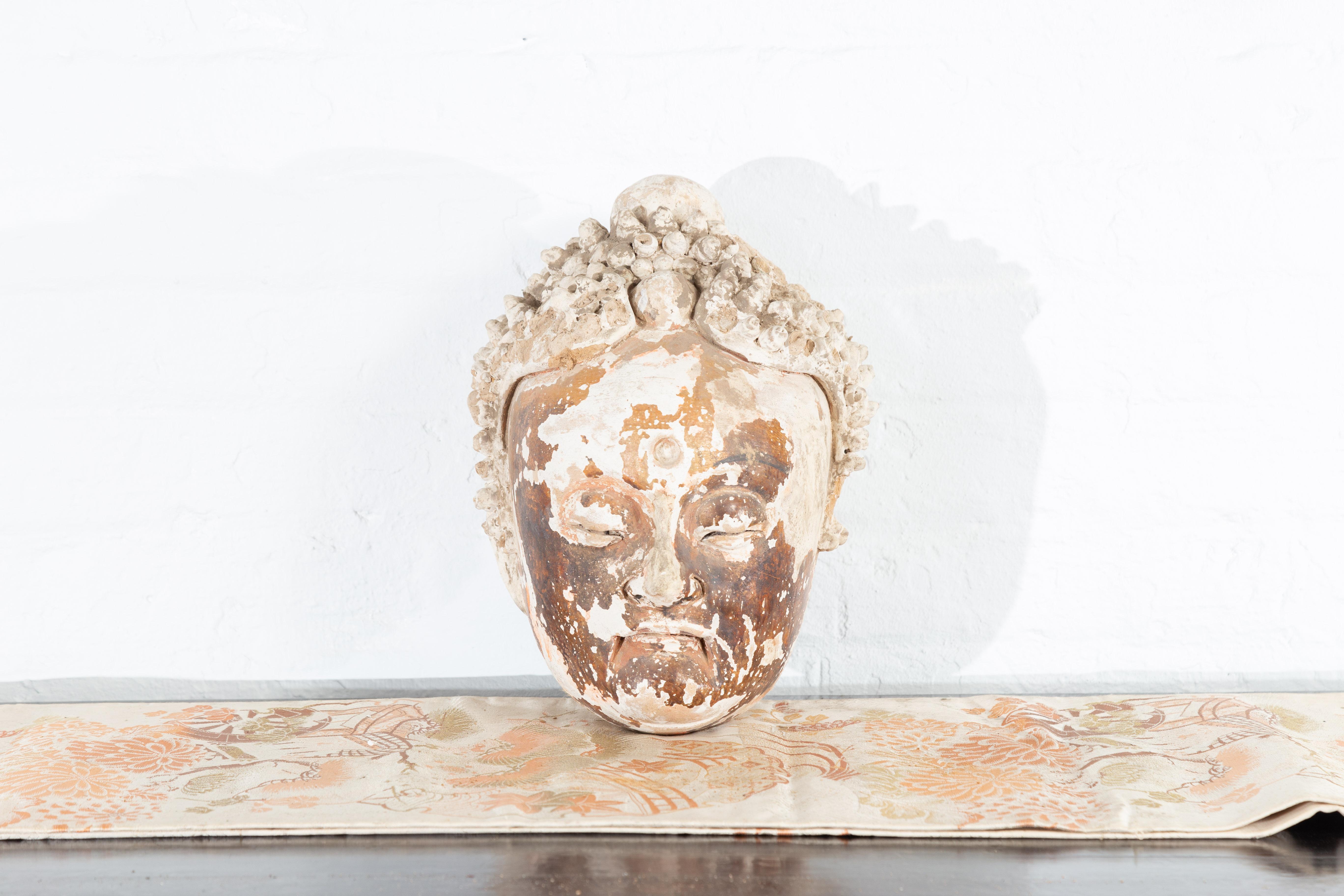 Chinese Yuan Dynasty 14th Century Carved Stucco Buddha Head with Custom Stand In Good Condition In Yonkers, NY