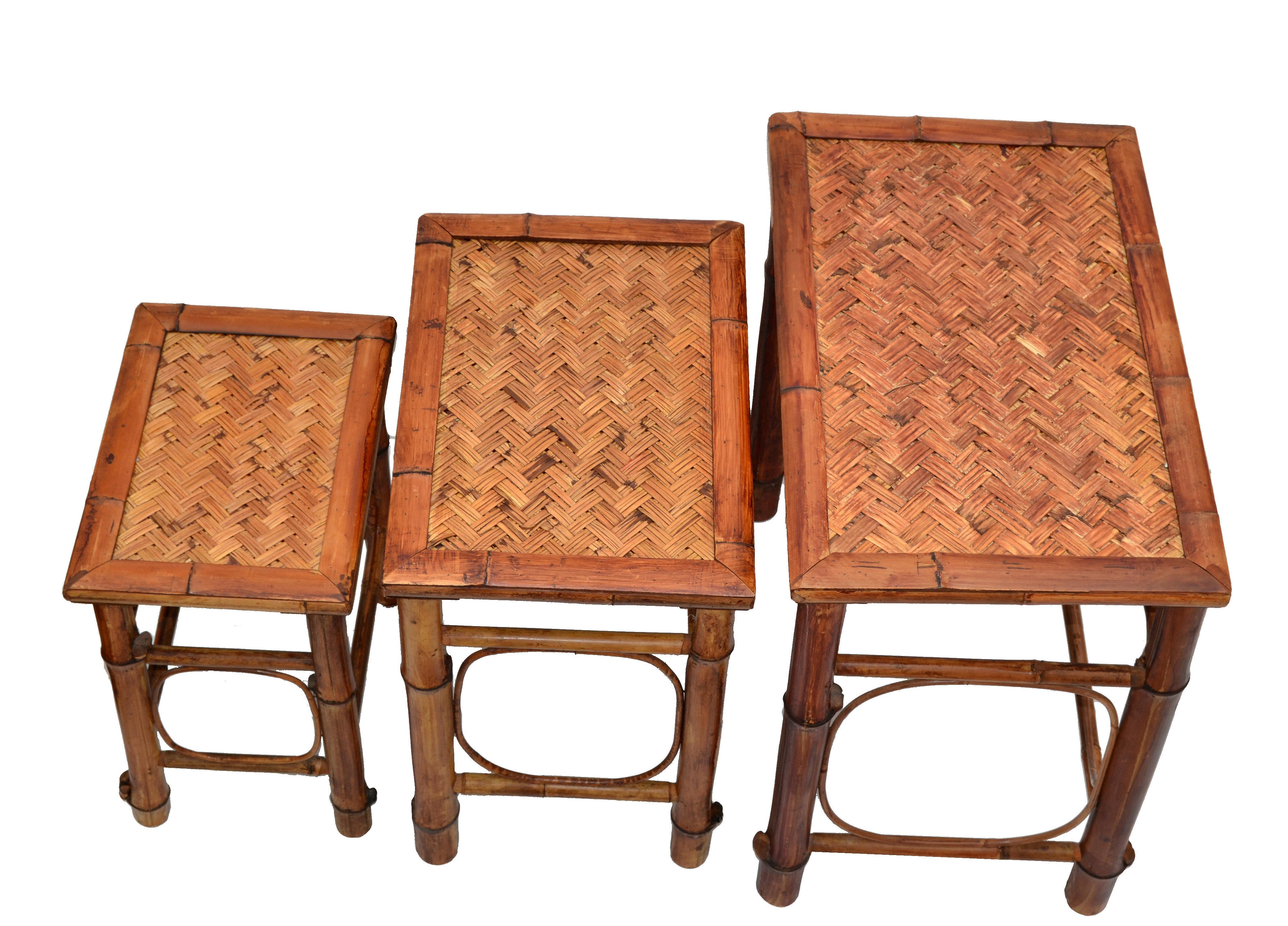 Asian modern chinoiserie bamboo & handwoven cane top set of 3 nesting tables or stacking tables.
Size of each table:
14.25 D x 22.25 L x 21.25 inches H.
12.25 D x 13.25 L x 17.75 inches H.
10.0 D x 13.63 L x 15.75 inches H.