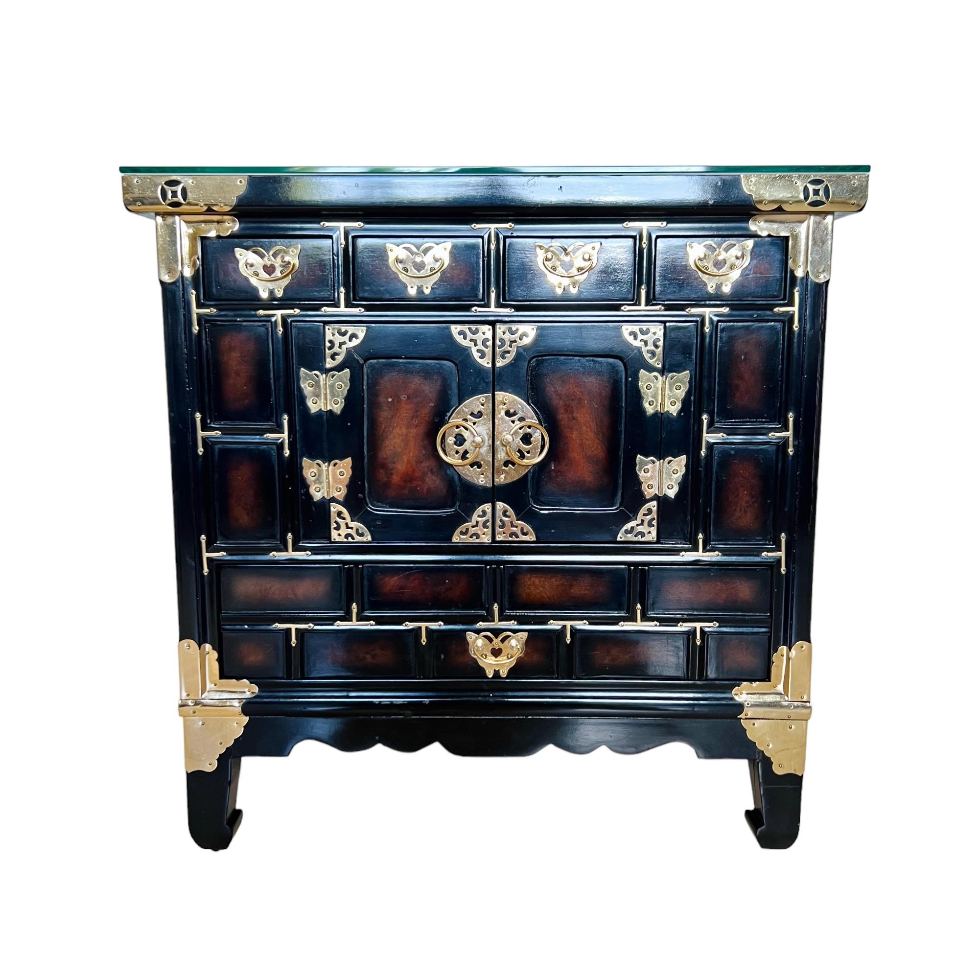 Carved Chinoiserie Black & Faux Burl Brass Mounted Chest, 1970s For Sale