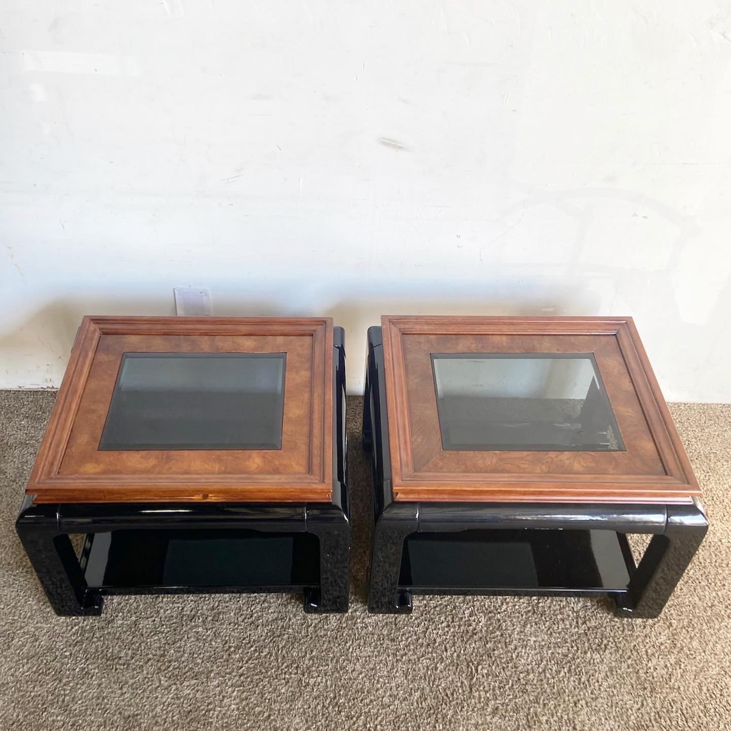 Elevate your interior with these Chinoiserie Black Lacquered and Burl Wood Glass Top Side Tables. These tables blend Eastern aesthetics with modern design, featuring intricate burl wood inlays and glass tops.
Some chips and wear as seen in the