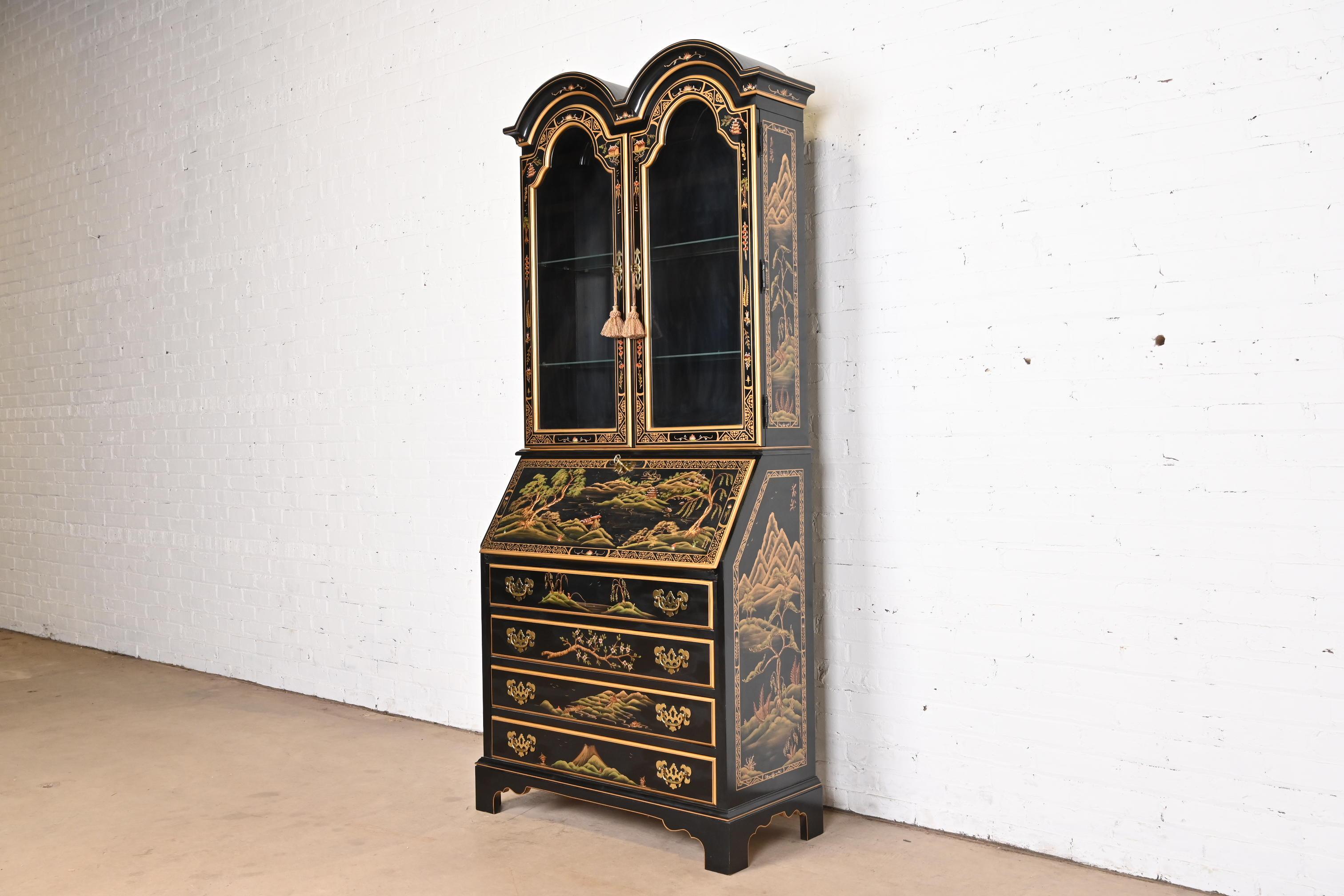 A gorgeous Georgian Chinoiserie style bureau with drop front secretary desk and lighted bookcase hutch top

By Jasper Furniture Company

USA, Late 20th Century

Black lacquered walnut, with hand-painted Asian scenes, glass front doors, and original