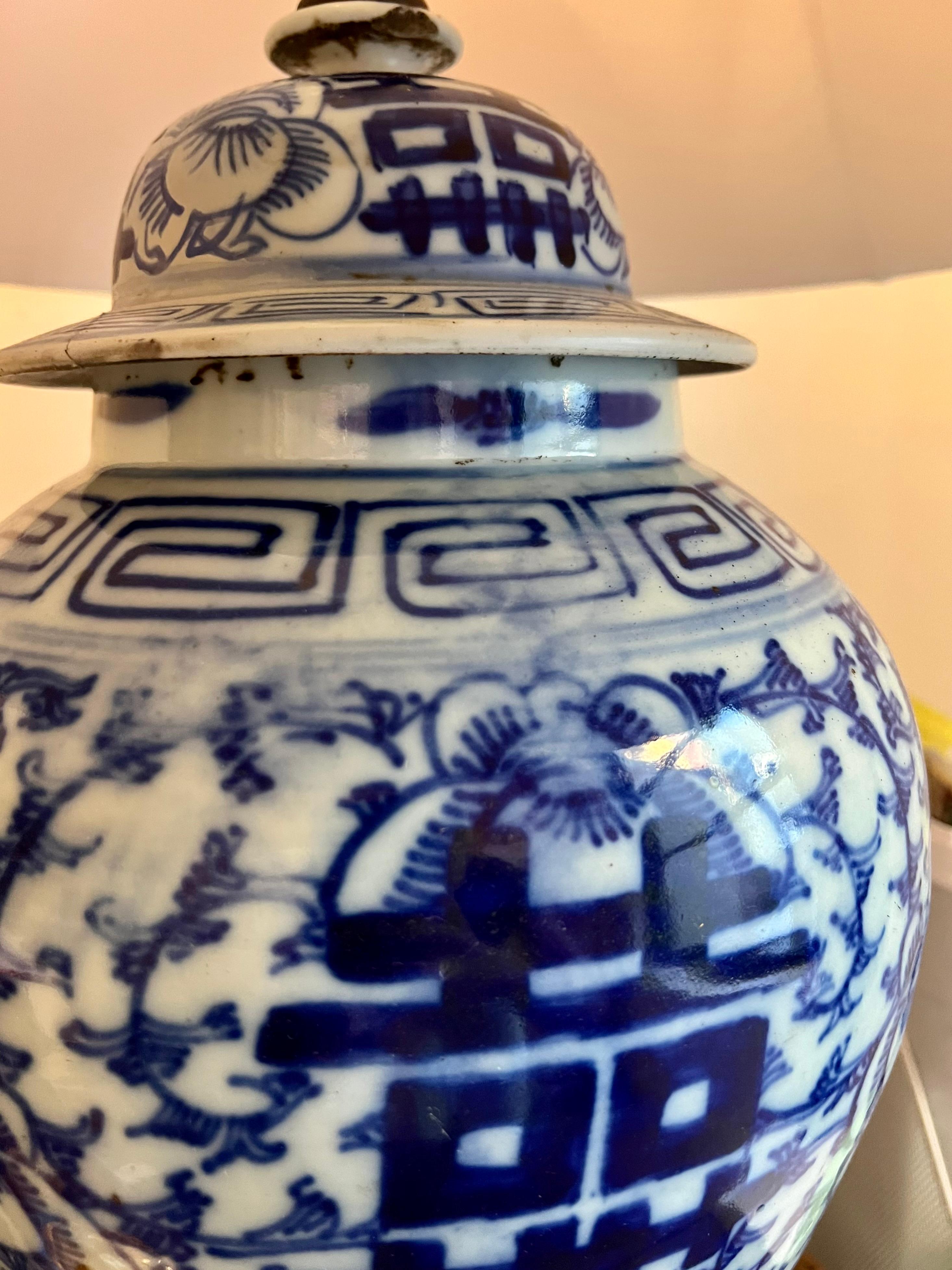 Vintage Chinese ginger jar lamp with custom raw silk shade, trimmed in antique indigo textile on top and bottom. Wood base. Originally bought from legendary Los Angeles dealer Brenda Antin in th 90’s.

Lamp dimensions: 30” H (to top of shade) x