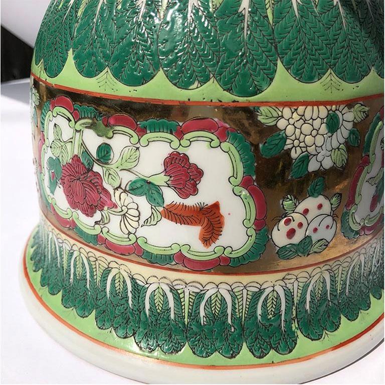 Porcelain Ceramic Famille Vert Rose Green Gold planter pot. Small pot decorated in beautiful dark and light greens, reds, and gold. Hand-painted scenes of birds and roses on a gold background. Surrounding both the top lip and bottom base are cabbage