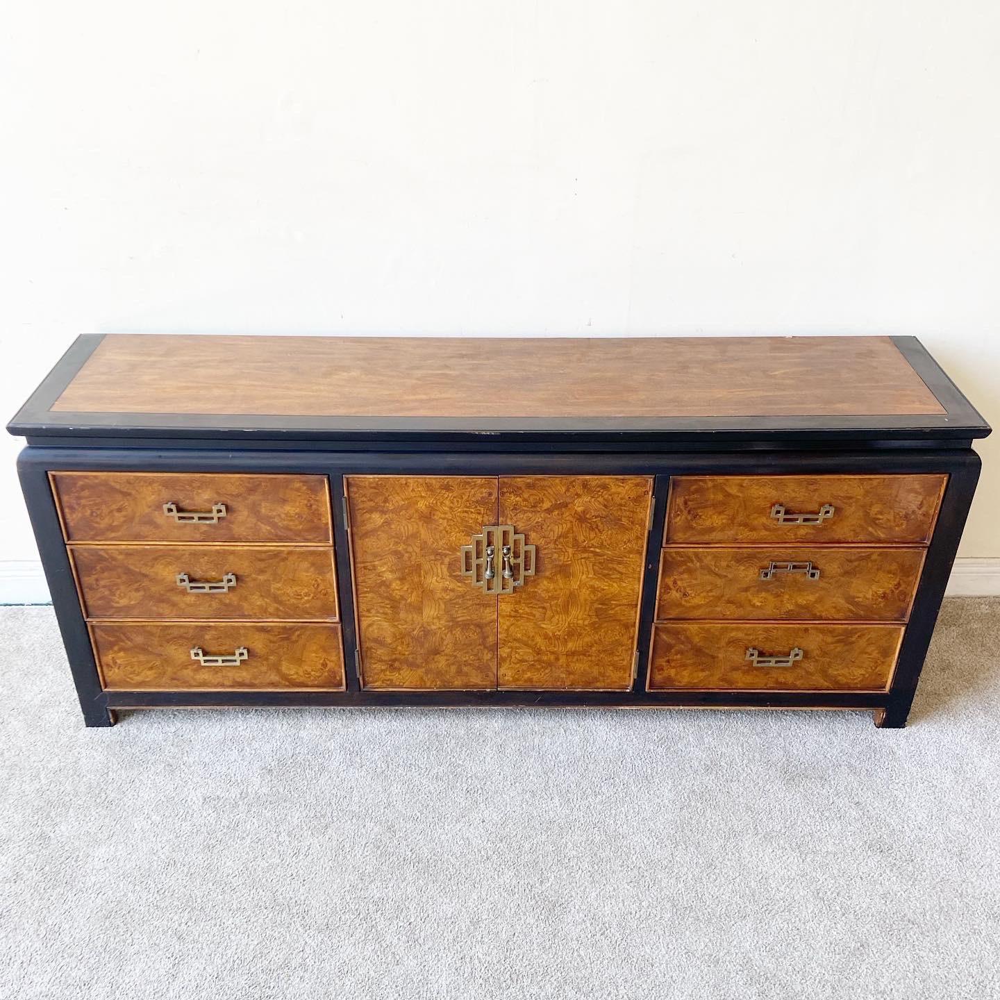 Exceptional chinoiserie dresser by Century Furniture. Features burl wood drawer faces with a black frame.
 