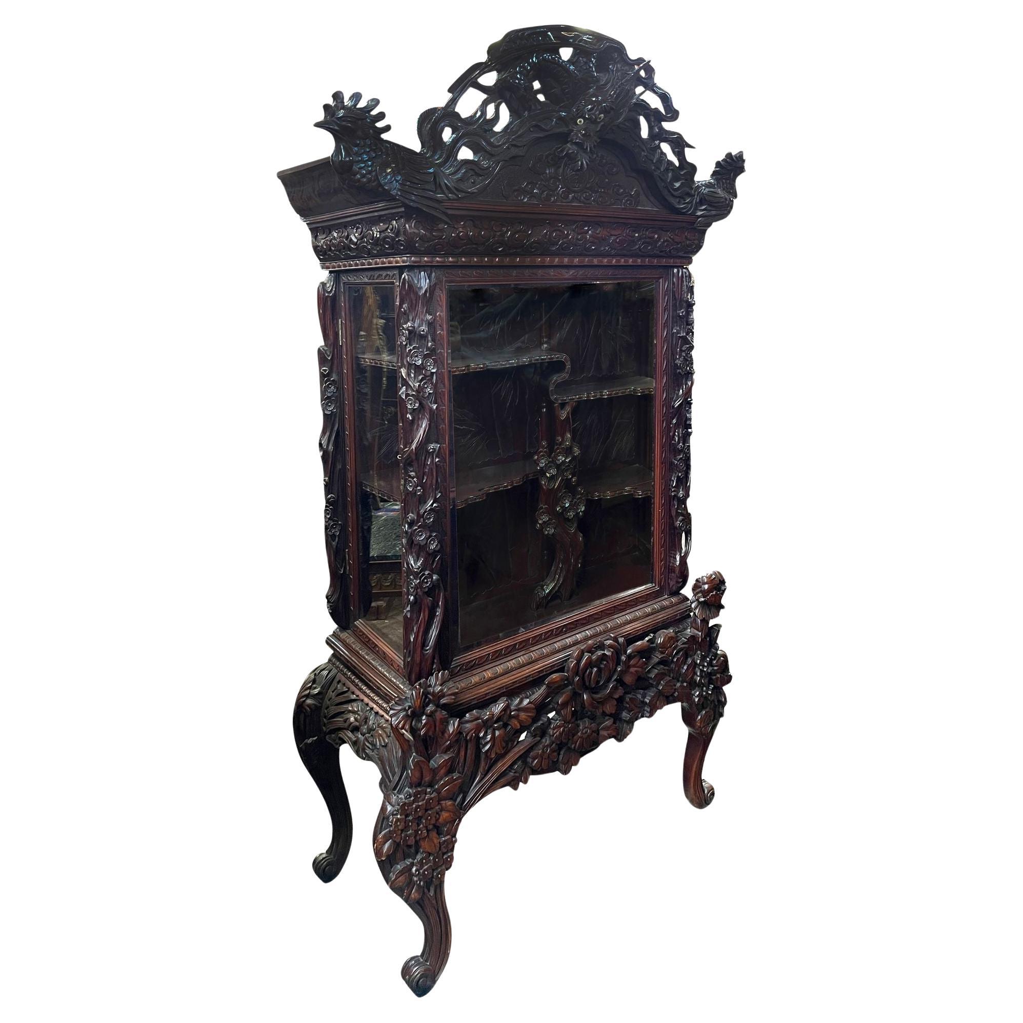 Chinoiserie carved wood display cabinet, circa 1880.