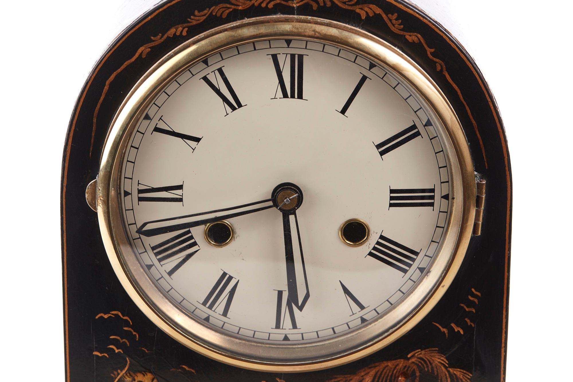 Offered for sale is this charming chinoiserie cased dome topped mantel clock with circular dial and twin chain movement. Lacquered case, 8 day movement. 

Perfect working order and original key.

  