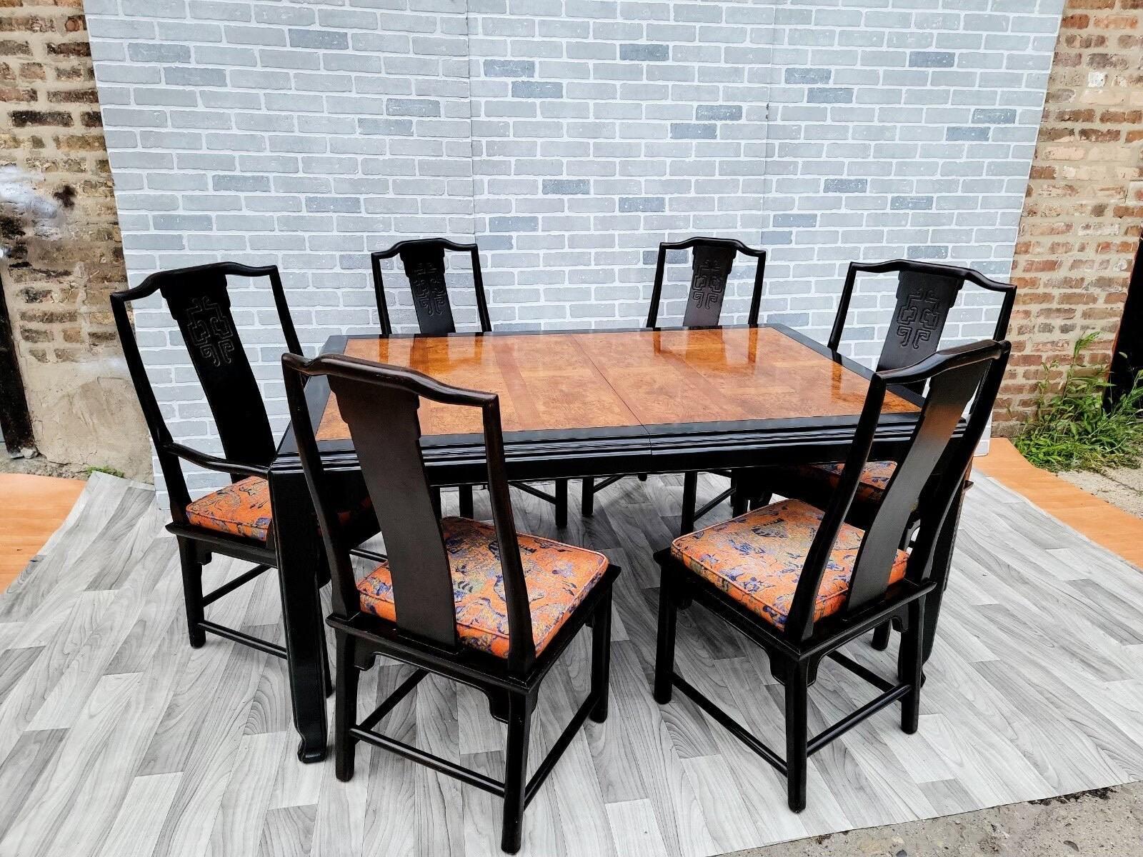 Hollywood Regency Chinoiserie Chin Hua Ebonized Dining Set By Raymond K. Sobota for Century Furniture - 8 Piece Set 

This gorgeous Asian Style dining set includes 4 side and 2 armchairs and a fabulous dining table designed by Raymond K. Sobota