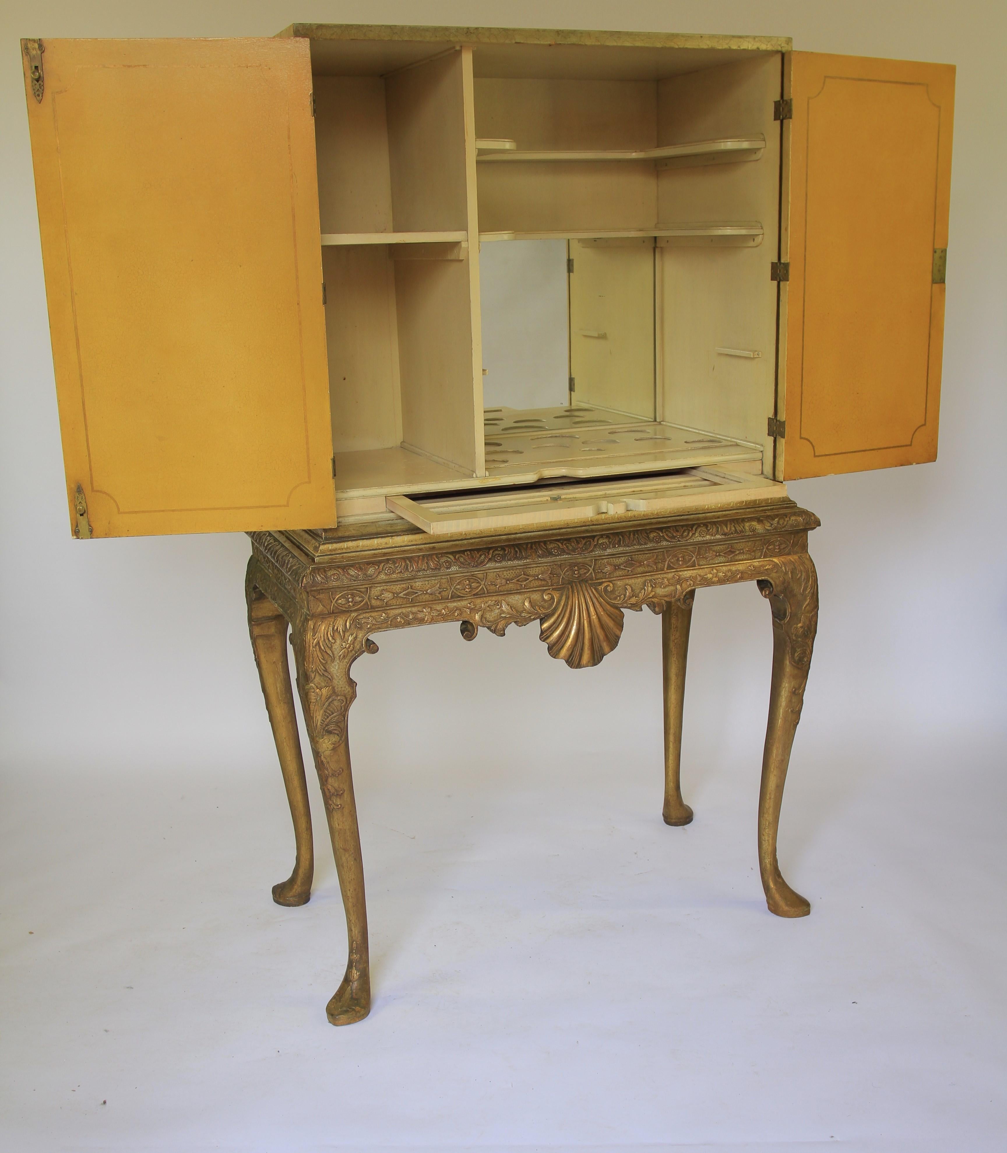 British Chinoiserie decorated Cocktail cabinet on stand For Sale