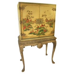 Antique Chinoiserie decorated Cocktail cabinet on stand