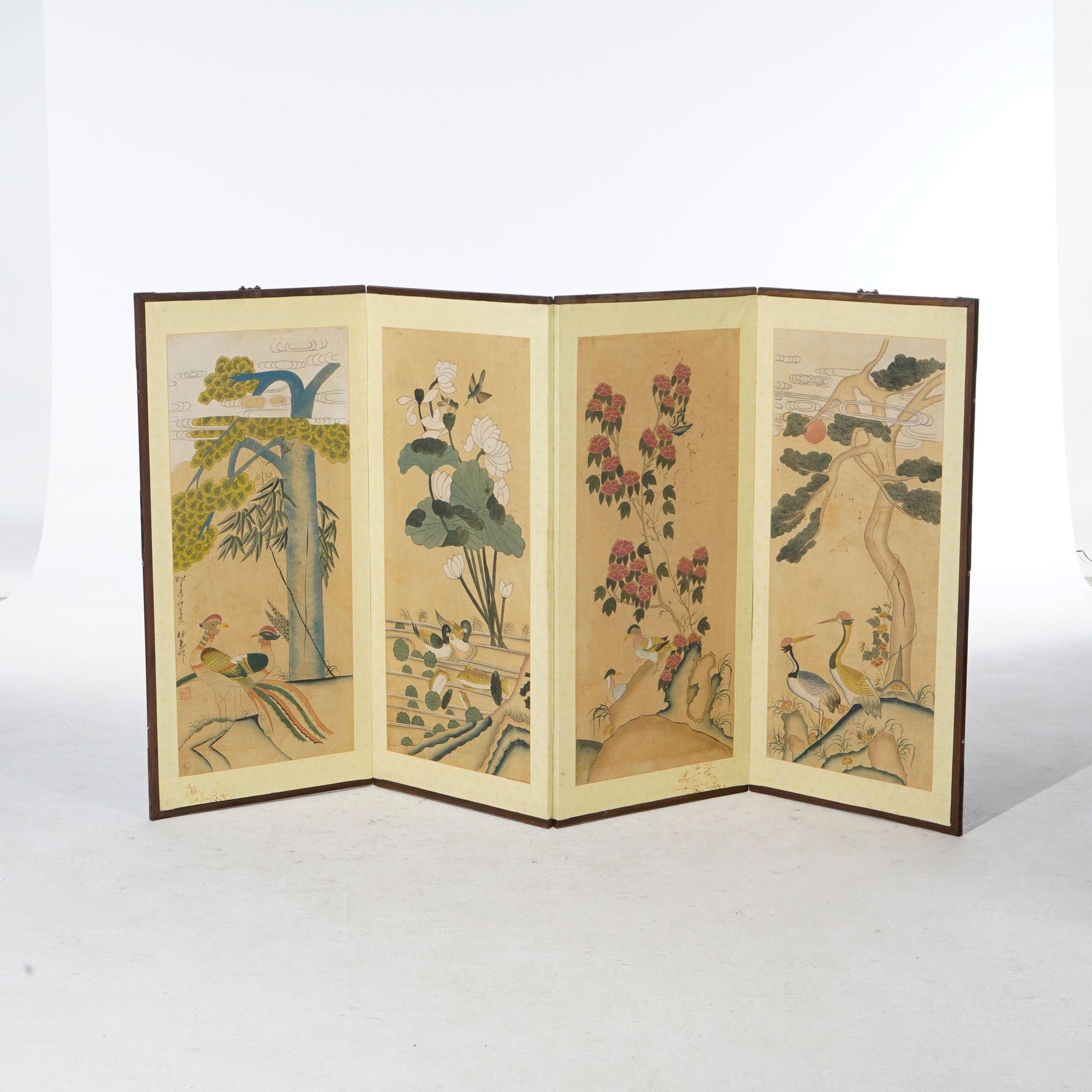 A Chinoiserie decorated table top screen offers paper over wood construction with four panels, each having garden screen, 20th century

Measures- 36''H x 65''W x 1''D.