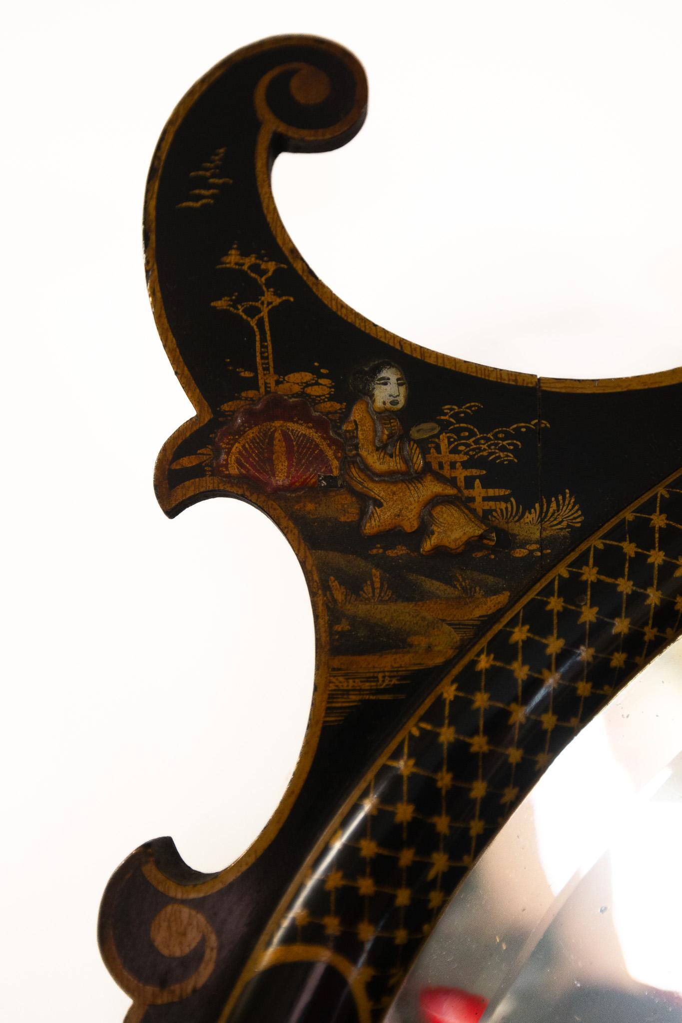 Lacquered Chinoiserie decorated oval wall mirror 1930s For Sale