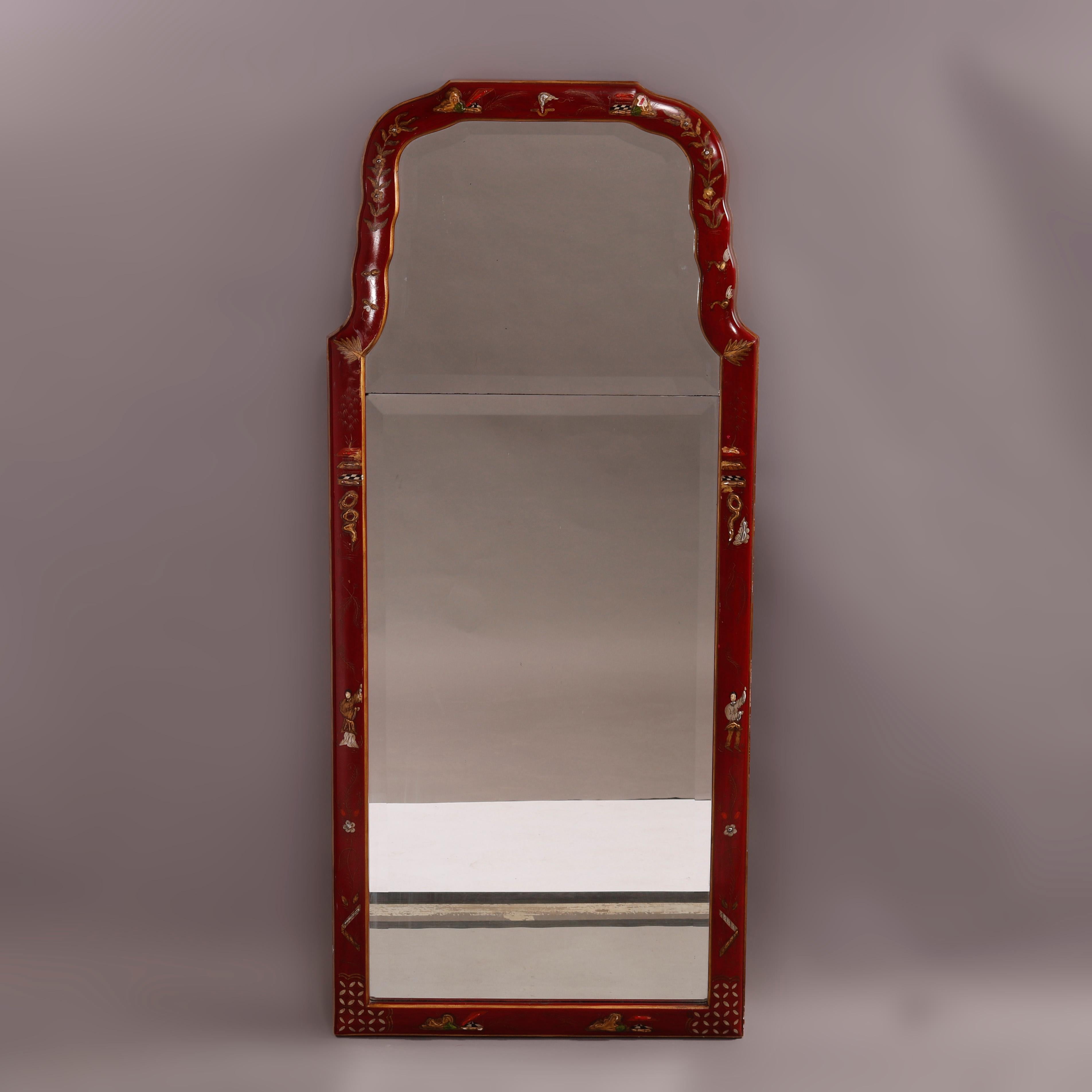 Un miroir mural décoré de Chinoiserie offre une forme façonnée avec un cadre rouge vermillon ayant des éléments de feuillage et de treillis émaillés à la main, entourant un miroir biseauté, 20e siècle

Mesures- 48.75''H x 21.25''W x 1.5''D.

Note