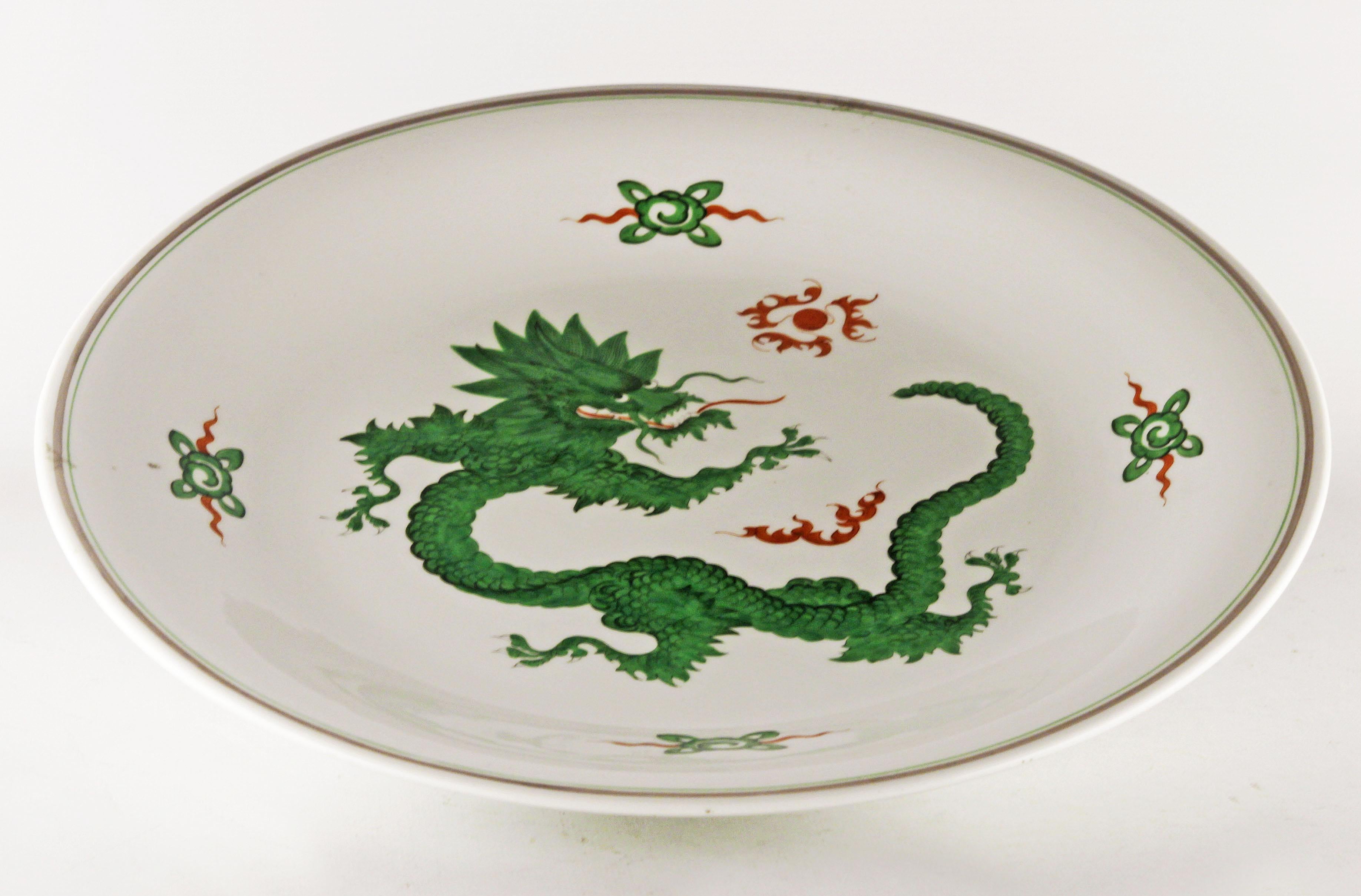 Chinoiserie german dinner plate with painted green Ming dragon by Meissen Porcelain

By: Meissen Porcelain
Material: porcelain, paint, enamel, ceramic
Technique: enameled, glazed, hand-painted, molded, painted, pressed
Dimensions: 14 in x 1.5