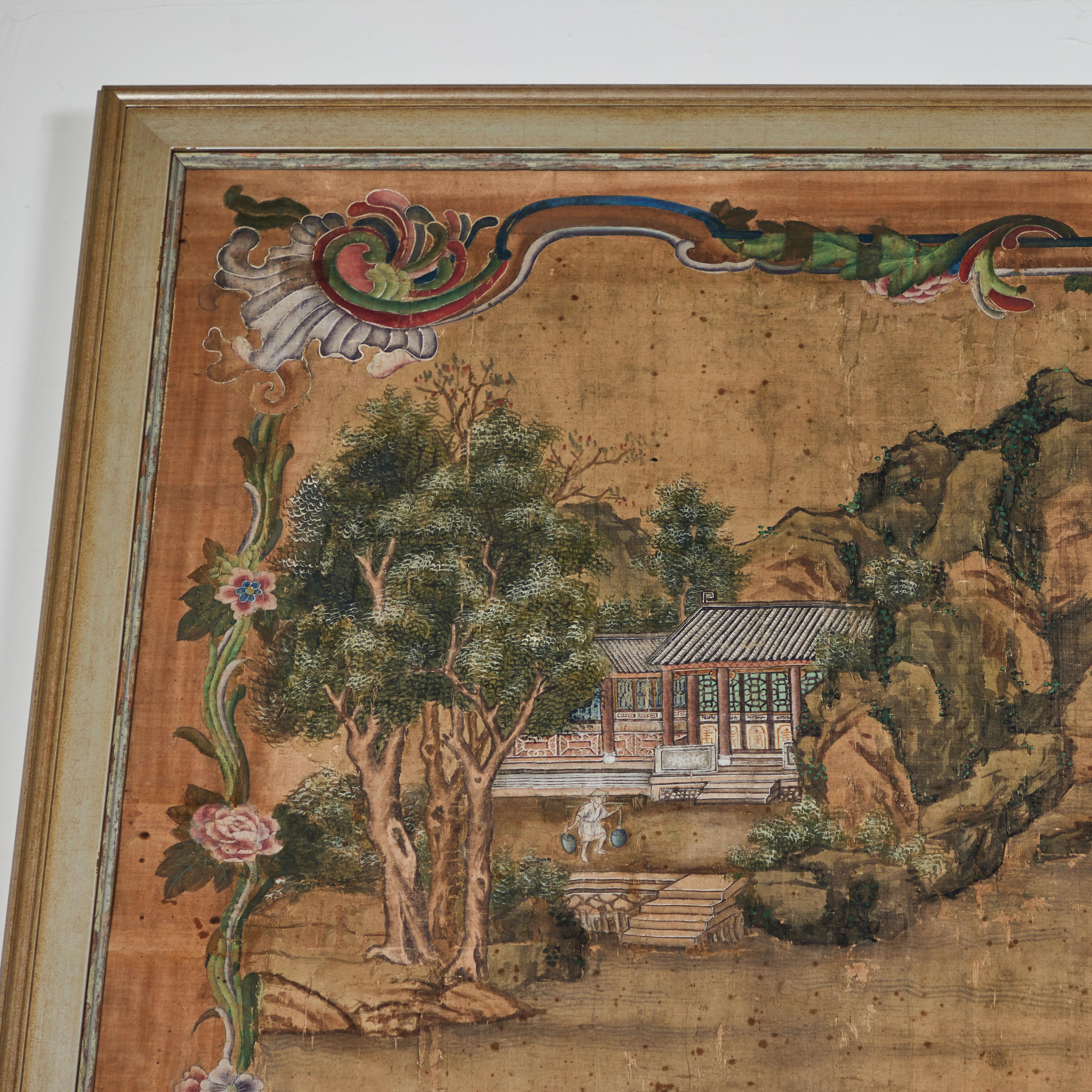 Chinoiserie gouache painting on silk of a village and figures. Silver gilt frame.