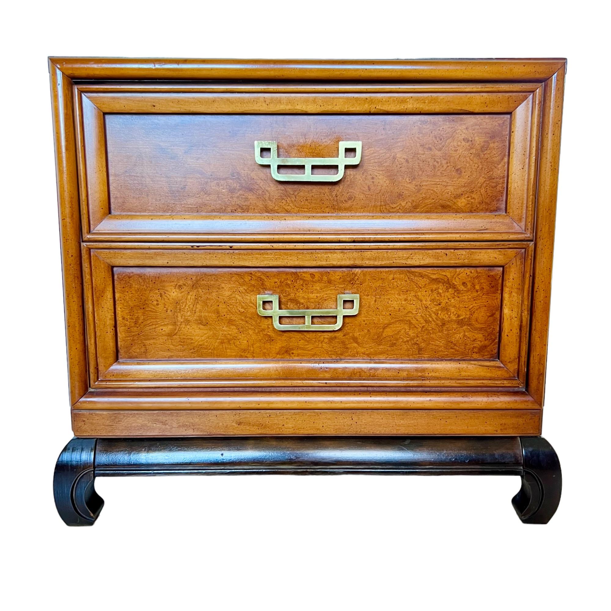 A vintage Hollywood Regency style Henry Link Mandarin collection two drawer nightstand or commode. Chinoiserie design featuring burl wood drawer faces, open fretwork brass handles and a rosewood Ming style chow foot platform