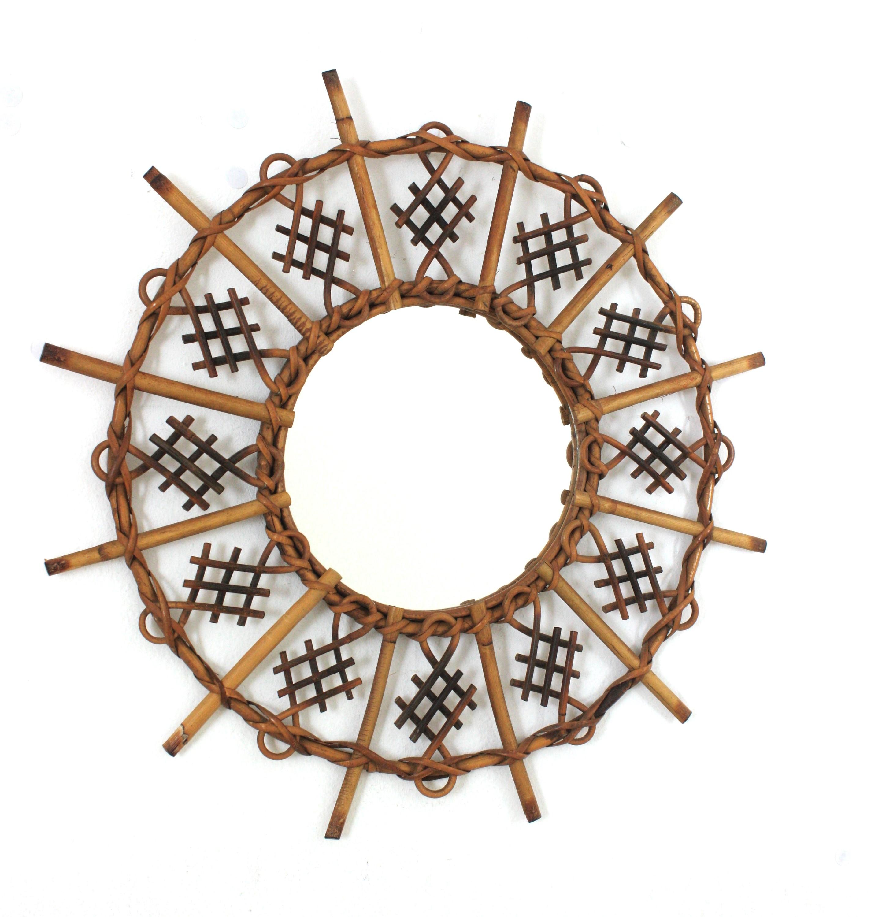 Rattan Round Sunburst Mirror with Chinoiserie and Pirography Accents, France, 1950s-1960s
This eye-catching Mediterranean sunburst mirror was handcrafted in France at the sixties and it has all the taste of the French Riviera.
The sunburst rattan