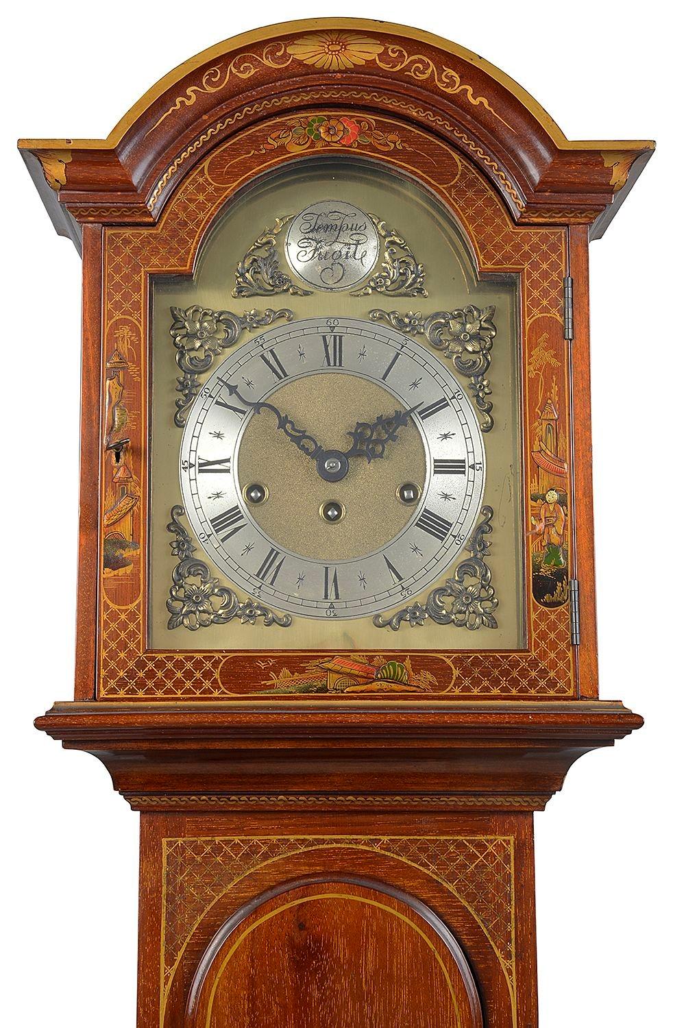 A good quality early 20th Century Mahogany Grandmother clock, having wonderful Chinoiserie lacquer decoration to the whole, depicting classical scenes of various courtiers, pagoda building and scrolling foliage.
The brass faced three train eight day