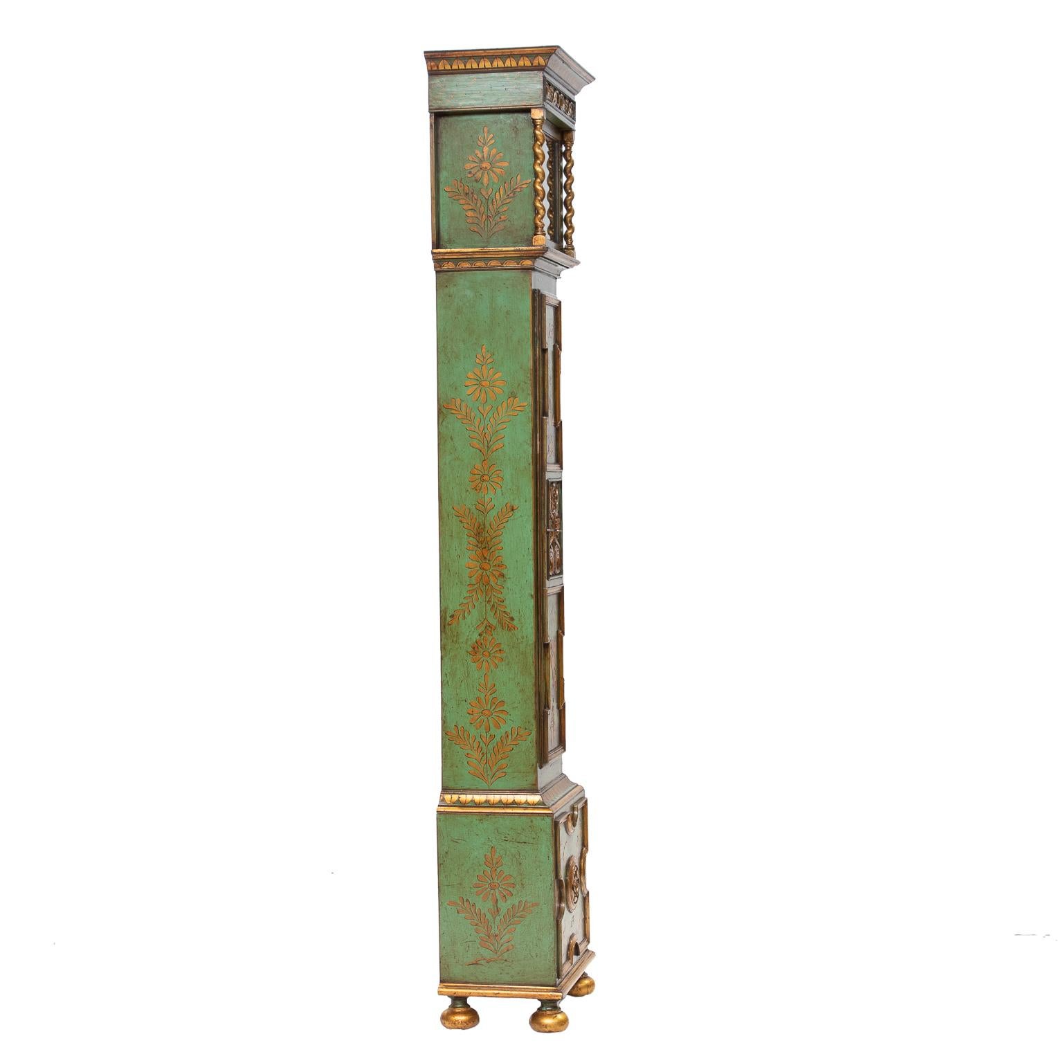 Chinoiserie lacquered grandmother clock. Wonderful detail and color applied. Painted over gesso and raised figures. Brass Dial face with chimes on the quarter hour and two chime options on the hour, Whittington and Westminster. The case is in very